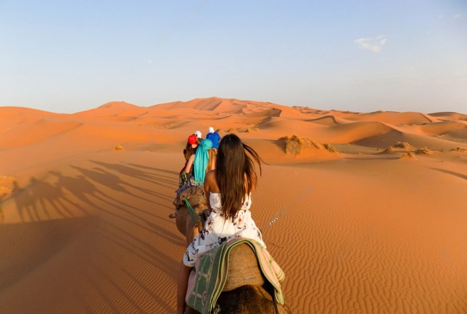 Things-to-do-in-Marrakech-for-Young-Adults-Camel-ride-in-sahara-desert.webp