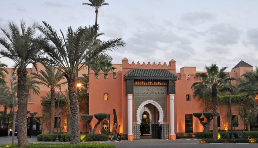 marrakech-morocco-april-palm-trees-and-main-facade-of-the-famous-hotel-of-la-mamounia-.jpg