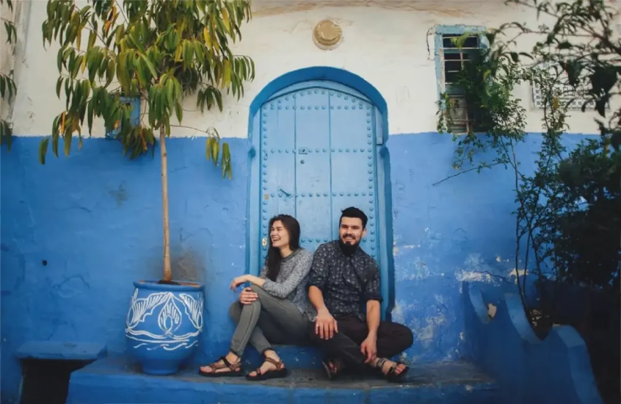 {"type":"elementor","siteurl":"https://www.moroccotravel.co/wp-json/","elements":[{"id":"4e0ab80f","elType":"widget","isInner":false,"isLocked":false,"settings":{"editor":"<h2> <span style=\"color: var(--heading-color); font-family: Poppins, sans-serif; font-size: 20px;\">What to Wear in Moroccan Cities</span></h2><p><a href=\"https://www.moroccotravel.co/wp-content/uploads/2025/01/what-to-wear-in-marrakech-in-january.webp\"><img class=\"alignnone wp-image-32610 size-large\" src=\"https://www.moroccotravel.co/wp-content/uploads/2025/01/what-to-wear-in-marrakech-in-january-1280x805.webp\" alt=\"{"type":"elementor","siteurl":"https://www.moroccotravel.co/wp-json/","elements":[{"id":"4e0ab80f","elType":"widget","isInner":false,"isLocked":false,"settings":{"editor":"<h2> <span style=\\"color: var(--heading-color); font-family: Poppins, sans-serif; font-size: 20px;\\">What to Wear in Moroccan Cities</span></h2><p><span style=\\"font-family: arial, helvetica, sans-serif;\\"><a href=\\"https://www.moroccotravel.co/wp-content/uploads/2024/06/15-days-in-Morocco-Chefchaouen.webp\\"><img src=\\"https://www.moroccotravel.co/wp-content/uploads/2024/06/15-days-in-Morocco-Chefchaouen-1280x851.webp\\" alt=\\"15 days in Morocco Chefchaouen\\" width=\\"1280\\" height=\\"851\\" /></a></span></p><h3><span style=\\"font-family: Poppins, sans-serif;\\"><span style=\\"font-size: 20px;\\">Marrakech: Vibrant and Mildly Cool</span></span></h3><p data-pm-slice=\\"1 1 []\\">In Marrakech, you’ll encounter a mix of sunny afternoons and chilly evenings. Opt for lightweight, breathable fabrics during the day, such as long-sleeve cotton tops or linen shirts, paired with trousers or maxi skirts. For evenings, pack a warm jacket or a thick sweater to stay comfortable as temperatures drop. Comfortable walking shoes are essential, as you’ll likely spend hours exploring the bustling souks and historical landmarks like the Bahia Palace.</p><p data-pm-slice=\\"1 1 []\\"><b>Tip:</b> Carry a scarf or shawl. It’s perfect for layering and can also be used to cover your head or shoulders when visiting mosques or other religious sites.</p><h3><span style=\\"font-family: Poppins, sans-serif;\\"><span style=\\"font-size: 20px;\\">Casablanca: Urban Sophistication</span></span></h3><p data-pm-slice=\\"1 1 []\\">Casablanca, a cosmopolitan hub, has mild winter weather, making it ideal for stylish but practical attire. Pack a pair of jeans, a cozy sweater, and a lightweight jacket. Layering is less critical here, as the coastal climate remains relatively consistent. For footwear, consider loafers or ankle boots to complement a smart-casual look suitable for dining at local restaurants or visiting the Hassan II Mosque.</p><div> </div><h2 data-pm-slice=\\"1 1 []\\">Dressing for Cultural and Historical Cities</h2><p><span style=\\"font-family: arial, helvetica, sans-serif;\\"><a href=\\"https://www.moroccotravel.co/wp-content/uploads/2024/06/15-days-in-Morocco-Chefchaouen.webp\\"><img src=\\"https://www.moroccotravel.co/wp-content/uploads/2024/06/15-days-in-Morocco-Chefchaouen-1280x851.webp\\" alt=\\"15 days in Morocco Chefchaouen\\" width=\\"1280\\" height=\\"851\\" /></a></span></p><h3><span style=\\"font-family: Poppins, sans-serif;\\"><span style=\\"font-size: 20px;\\">Fez: Traditional and Cool</span></span></h3><p>Fez’s winter weather can feel quite chilly, especially in the mornings and evenings. While exploring the UNESCO-listed medina, choose modest attire like long-sleeve tops, warm trousers, and a medium-weight coat. The city’s traditional atmosphere calls for culturally respectful clothing, so avoid wearing shorts or revealing tops. Don’t forget a pair of sturdy shoes to navigate the narrow, uneven streets.</p><h3><span style=\\"font-family: Poppins, sans-serif;\\"><span style=\\"font-size: 20px;\\">Chefchaouen: Cool Weather and Scenic Views</span></span></h3><p>Known for its iconic blue-washed buildings, Chefchaouen’s January temperatures are cool and crisp, especially due to its mountainous location. A cozy fleece or puffer jacket is a must, along with long trousers and layered tops. Add a beanie or gloves for extra warmth during early morning strolls. The city’s relaxed vibe allows for casual clothing, but always prioritize comfort and modesty.</p>","align":"left","text_color":"#1A2B48","typography_typography":"custom","typography_font_family":"Arial","typography_font_size":{"unit":"px","size":1,"sizes":[]},"typography_font_size_laptop":{"unit":"em","size":"","sizes":[]},"typography_font_size_tablet":{"unit":"em","size":"","sizes":[]},"typography_font_size_mobile":{"unit":"em","size":"","sizes":[]},"typography_font_weight":"400","drop_cap":"","text_columns":"","text_columns_laptop":"","text_columns_tablet":"","text_columns_mobile":"","column_gap":{"unit":"px","size":"","sizes":[]},"column_gap_laptop":{"unit":"px","size":"","sizes":[]},"column_gap_tablet":{"unit":"px","size":"","sizes":[]},"column_gap_mobile":{"unit":"px","size":"","sizes":[]},"align_laptop":"","align_tablet":"","align_mobile":"","typography_text_transform":"","typography_font_style":"","typography_text_decoration":"","typography_line_height":{"unit":"px","size":"","sizes":[]},"typography_line_height_laptop":{"unit":"px","size":"","sizes":[]},"typography_line_height_tablet":{"unit":"em","size":"","sizes":[]},"typography_line_height_mobile":{"unit":"em","size":"","sizes":[]},"typography_letter_spacing":{"unit":"px","size":"","sizes":[]},"typography_letter_spacing_laptop":{"unit":"px","size":"","sizes":[]},"typography_letter_spacing_tablet":{"unit":"px","size":"","sizes":[]},"typography_letter_spacing_mobile":{"unit":"px","size":"","sizes":[]},"typography_word_spacing":{"unit":"px","size":"","sizes":[]},"typography_word_spacing_laptop":{"unit":"px","size":"","sizes":[]},"typography_word_spacing_tablet":{"unit":"em","size":"","sizes":[]},"typography_word_spacing_mobile":{"unit":"em","size":"","sizes":[]},"text_shadow_text_shadow_type":"","text_shadow_text_shadow":{"horizontal":0,"vertical":0,"blur":10,"color":"rgba(0,0,0,0.3)"},"paragraph_spacing":{"unit":"px","size":"","sizes":[]},"paragraph_spacing_laptop":{"unit":"px","size":"","sizes":[]},"paragraph_spacing_tablet":{"unit":"px","size":"","sizes":[]},"paragraph_spacing_mobile":{"unit":"px","size":"","sizes":[]},"drop_cap_view":"default","drop_cap_primary_color":"","drop_cap_secondary_color":"","drop_cap_shadow_text_shadow_type":"","drop_cap_shadow_text_shadow":{"horizontal":0,"vertical":0,"blur":10,"color":"rgba(0,0,0,0.3)"},"drop_cap_size":{"unit":"px","size":5,"sizes":[]},"drop_cap_space":{"unit":"px","size":10,"sizes":[]},"drop_cap_border_radius":{"unit":"%","size":"","sizes":[]},"drop_cap_border_width":{"unit":"px","top":"","right":"","bottom":"","left":"","isLinked":true},"drop_cap_typography_typography":"","drop_cap_typography_font_family":"","drop_cap_typography_font_size":{"unit":"px","size":"","sizes":[]},"drop_cap_typography_font_size_laptop":{"unit":"px","size":"","sizes":[]},"drop_cap_typography_font_size_tablet":{"unit":"px","size":"","sizes":[]},"drop_cap_typography_font_size_mobile":{"unit":"px","size":"","sizes":[]},"drop_cap_typography_font_weight":"","drop_cap_typography_text_transform":"","drop_cap_typography_font_style":"","drop_cap_typography_text_decoration":"","drop_cap_typography_line_height":{"unit":"px","size":"","sizes":[]},"drop_cap_typography_line_height_laptop":{"unit":"px","size":"","sizes":[]},"drop_cap_typography_line_height_tablet":{"unit":"em","size":"","sizes":[]},"drop_cap_typography_line_height_mobile":{"unit":"em","size":"","sizes":[]},"drop_cap_typography_word_spacing":{"unit":"px","size":"","sizes":[]},"drop_cap_typography_word_spacing_laptop":{"unit":"px","size":"","sizes":[]},"drop_cap_typography_word_spacing_tablet":{"unit":"em","size":"","sizes":[]},"drop_cap_typography_word_spacing_mobile":{"unit":"em","size":"","sizes":[]},"_title":"","_margin":{"unit":"px","top":"","right":"","bottom":"","left":"","isLinked":true},"_margin_laptop":{"unit":"px","top":"","right":"","bottom":"","left":"","isLinked":true},"_margin_tablet":{"unit":"px","top":"","right":"","bottom":"","left":"","isLinked":true},"_margin_mobile":{"unit":"px","top":"","right":"","bottom":"","left":"","isLinked":true},"_padding":{"unit":"px","top":"","right":"","bottom":"","left":"","isLinked":true},"_padding_laptop":{"unit":"px","top":"","right":"","bottom":"","left":"","isLinked":true},"_padding_tablet":{"unit":"px","top":"","right":"","bottom":"","left":"","isLinked":true},"_padding_mobile":{"unit":"px","top":"","right":"","bottom":"","left":"","isLinked":true},"_element_width":"","_element_width_laptop":"","_element_width_tablet":"","_element_width_mobile":"","_element_custom_width":{"unit":"%","size":"","sizes":[]},"_element_custom_width_laptop":{"unit":"px","size":"","sizes":[]},"_element_custom_width_tablet":{"unit":"px","size":"","sizes":[]},"_element_custom_width_mobile":{"unit":"px","size":"","sizes":[]},"_flex_align_self":"","_flex_align_self_laptop":"","_flex_align_self_tablet":"","_flex_align_self_mobile":"","_flex_order":"","_flex_order_laptop":"","_flex_order_tablet":"","_flex_order_mobile":"","_flex_order_custom":"","_flex_order_custom_laptop":"","_flex_order_custom_tablet":"","_flex_order_custom_mobile":"","_flex_size":"","_flex_size_laptop":"","_flex_size_tablet":"","_flex_size_mobile":"","_flex_grow":1,"_flex_grow_laptop":"","_flex_grow_tablet":"","_flex_grow_mobile":"","_flex_shrink":1,"_flex_shrink_laptop":"","_flex_shrink_tablet":"","_flex_shrink_mobile":"","_element_vertical_align":"","_element_vertical_align_laptop":"","_element_vertical_align_tablet":"","_element_vertical_align_mobile":"","_position":"","_offset_orientation_h":"start","_offset_x":{"unit":"px","size":0,"sizes":[]},"_offset_x_laptop":{"unit":"px","size":"","sizes":[]},"_offset_x_tablet":{"unit":"px","size":"","sizes":[]},"_offset_x_mobile":{"unit":"px","size":"","sizes":[]},"_offset_x_end":{"unit":"px","size":0,"sizes":[]},"_offset_x_end_laptop":{"unit":"px","size":"","sizes":[]},"_offset_x_end_tablet":{"unit":"px","size":"","sizes":[]},"_offset_x_end_mobile":{"unit":"px","size":"","sizes":[]},"_offset_orientation_v":"start","_offset_y":{"unit":"px","size":0,"sizes":[]},"_offset_y_laptop":{"unit":"px","size":"","sizes":[]},"_offset_y_tablet":{"unit":"px","size":"","sizes":[]},"_offset_y_mobile":{"unit":"px","size":"","sizes":[]},"_offset_y_end":{"unit":"px","size":0,"sizes":[]},"_offset_y_end_laptop":{"unit":"px","size":"","sizes":[]},"_offset_y_end_tablet":{"unit":"px","size":"","sizes":[]},"_offset_y_end_mobile":{"unit":"px","size":"","sizes":[]},"_z_index":"","_z_index_laptop":"","_z_index_tablet":"","_z_index_mobile":"","_element_id":"","_css_classes":"","e_display_conditions":"","motion_fx_motion_fx_scrolling":"","motion_fx_translateY_effect":"","motion_fx_translateY_direction":"","motion_fx_translateY_speed":{"unit":"px","size":4,"sizes":[]},"motion_fx_translateY_affectedRange":{"unit":"%","size":"","sizes":{"start":0,"end":100}},"motion_fx_translateX_effect":"","motion_fx_translateX_direction":"","motion_fx_translateX_speed":{"unit":"px","size":4,"sizes":[]},"motion_fx_translateX_affectedRange":{"unit":"%","size":"","sizes":{"start":0,"end":100}},"motion_fx_opacity_effect":"","motion_fx_opacity_direction":"out-in","motion_fx_opacity_level":{"unit":"px","size":10,"sizes":[]},"motion_fx_opacity_range":{"unit":"%","size":"","sizes":{"start":20,"end":80}},"motion_fx_blur_effect":"","motion_fx_blur_direction":"out-in","motion_fx_blur_level":{"unit":"px","size":7,"sizes":[]},"motion_fx_blur_range":{"unit":"%","size":"","sizes":{"start":20,"end":80}},"motion_fx_rotateZ_effect":"","motion_fx_rotateZ_direction":"","motion_fx_rotateZ_speed":{"unit":"px","size":1,"sizes":[]},"motion_fx_rotateZ_affectedRange":{"unit":"%","size":"","sizes":{"start":0,"end":100}},"motion_fx_scale_effect":"","motion_fx_scale_direction":"out-in","motion_fx_scale_speed":{"unit":"px","size":4,"sizes":[]},"motion_fx_scale_range":{"unit":"%","size":"","sizes":{"start":20,"end":80}},"motion_fx_transform_origin_x":"center","motion_fx_transform_origin_y":"center","motion_fx_devices":["desktop","laptop","tablet","mobile"],"motion_fx_range":"","motion_fx_motion_fx_mouse":"","motion_fx_mouseTrack_effect":"","motion_fx_mouseTrack_direction":"","motion_fx_mouseTrack_speed":{"unit":"px","size":1,"sizes":[]},"motion_fx_tilt_effect":"","motion_fx_tilt_direction":"","motion_fx_tilt_speed":{"unit":"px","size":4,"sizes":[]},"handle_motion_fx_asset_loading":"","sticky":"","sticky_on":["desktop","laptop","tablet","mobile"],"sticky_offset":0,"sticky_offset_laptop":"","sticky_offset_tablet":"","sticky_offset_mobile":"","sticky_effects_offset":0,"sticky_effects_offset_laptop":"","sticky_effects_offset_tablet":"","sticky_effects_offset_mobile":"","sticky_anchor_link_offset":0,"sticky_anchor_link_offset_laptop":"","sticky_anchor_link_offset_tablet":"","sticky_anchor_link_offset_mobile":"","sticky_parent":"","_animation":"","_animation_laptop":"","_animation_tablet":"","_animation_mobile":"","animation_duration":"","_animation_delay":"","_transform_rotate_popover":"","_transform_rotateZ_effect":{"unit":"px","size":"","sizes":[]},"_transform_rotateZ_effect_laptop":{"unit":"deg","size":"","sizes":[]},"_transform_rotateZ_effect_tablet":{"unit":"deg","size":"","sizes":[]},"_transform_rotateZ_effect_mobile":{"unit":"deg","size":"","sizes":[]},"_transform_rotate_3d":"","_transform_rotateX_effect":{"unit":"px","size":"","sizes":[]},"_transform_rotateX_effect_laptop":{"unit":"deg","size":"","sizes":[]},"_transform_rotateX_effect_tablet":{"unit":"deg","size":"","sizes":[]},"_transform_rotateX_effect_mobile":{"unit":"deg","size":"","sizes":[]},"_transform_rotateY_effect":{"unit":"px","size":"","sizes":[]},"_transform_rotateY_effect_laptop":{"unit":"deg","size":"","sizes":[]},"_transform_rotateY_effect_tablet":{"unit":"deg","size":"","sizes":[]},"_transform_rotateY_effect_mobile":{"unit":"deg","size":"","sizes":[]},"_transform_perspective_effect":{"unit":"px","size":"","sizes":[]},"_transform_perspective_effect_laptop":{"unit":"px","size":"","sizes":[]},"_transform_perspective_effect_tablet":{"unit":"px","size":"","sizes":[]},"_transform_perspective_effect_mobile":{"unit":"px","size":"","sizes":[]},"_transform_translate_popover":"","_transform_translateX_effect":{"unit":"px","size":"","sizes":[]},"_transform_translateX_effect_laptop":{"unit":"px","size":"","sizes":[]},"_transform_translateX_effect_tablet":{"unit":"px","size":"","sizes":[]},"_transform_translateX_effect_mobile":{"unit":"px","size":"","sizes":[]},"_transform_translateY_effect":{"unit":"px","size":"","sizes":[]},"_transform_translateY_effect_laptop":{"unit":"px","size":"","sizes":[]},"_transform_translateY_effect_tablet":{"unit":"px","size":"","sizes":[]},"_transform_translateY_effect_mobile":{"unit":"px","size":"","sizes":[]},"_transform_scale_popover":"","_transform_keep_proportions":"yes","_transform_scale_effect":{"unit":"px","size":"","sizes":[]},"_transform_scale_effect_laptop":{"unit":"px","size":"","sizes":[]},"_transform_scale_effect_tablet":{"unit":"px","size":"","sizes":[]},"_transform_scale_effect_mobile":{"unit":"px","size":"","sizes":[]},"_transform_scaleX_effect":{"unit":"px","size":"","sizes":[]},"_transform_scaleX_effect_laptop":{"unit":"px","size":"","sizes":[]},"_transform_scaleX_effect_tablet":{"unit":"px","size":"","sizes":[]},"_transform_scaleX_effect_mobile":{"unit":"px","size":"","sizes":[]},"_transform_scaleY_effect":{"unit":"px","size":"","sizes":[]},"_transform_scaleY_effect_laptop":{"unit":"px","size":"","sizes":[]},"_transform_scaleY_effect_tablet":{"unit":"px","size":"","sizes":[]},"_transform_scaleY_effect_mobile":{"unit":"px","size":"","sizes":[]},"_transform_skew_popover":"","_transform_skewX_effect":{"unit":"px","size":"","sizes":[]},"_transform_skewX_effect_laptop":{"unit":"deg","size":"","sizes":[]},"_transform_skewX_effect_tablet":{"unit":"deg","size":"","sizes":[]},"_transform_skewX_effect_mobile":{"unit":"deg","size":"","sizes":[]},"_transform_skewY_effect":{"unit":"px","size":"","sizes":[]},"_transform_skewY_effect_laptop":{"unit":"deg","size":"","sizes":[]},"_transform_skewY_effect_tablet":{"unit":"deg","size":"","sizes":[]},"_transform_skewY_effect_mobile":{"unit":"deg","size":"","sizes":[]},"_transform_flipX_effect":"","_transform_flipY_effect":"","_transform_rotate_popover_hover":"","_transform_rotateZ_effect_hover":{"unit":"px","size":"","sizes":[]},"_transform_rotateZ_effect_hover_laptop":{"unit":"deg","size":"","sizes":[]},"_transform_rotateZ_effect_hover_tablet":{"unit":"deg","size":"","sizes":[]},"_transform_rotateZ_effect_hover_mobile":{"unit":"deg","size":"","sizes":[]},"_transform_rotate_3d_hover":"","_transform_rotateX_effect_hover":{"unit":"px","size":"","sizes":[]},"_transform_rotateX_effect_hover_laptop":{"unit":"deg","size":"","sizes":[]},"_transform_rotateX_effect_hover_tablet":{"unit":"deg","size":"","sizes":[]},"_transform_rotateX_effect_hover_mobile":{"unit":"deg","size":"","sizes":[]},"_transform_rotateY_effect_hover":{"unit":"px","size":"","sizes":[]},"_transform_rotateY_effect_hover_laptop":{"unit":"deg","size":"","sizes":[]},"_transform_rotateY_effect_hover_tablet":{"unit":"deg","size":"","sizes":[]},"_transform_rotateY_effect_hover_mobile":{"unit":"deg","size":"","sizes":[]},"_transform_perspective_effect_hover":{"unit":"px","size":"","sizes":[]},"_transform_perspective_effect_hover_laptop":{"unit":"px","size":"","sizes":[]},"_transform_perspective_effect_hover_tablet":{"unit":"px","size":"","sizes":[]},"_transform_perspective_effect_hover_mobile":{"unit":"px","size":"","sizes":[]},"_transform_translate_popover_hover":"","_transform_translateX_effect_hover":{"unit":"px","size":"","sizes":[]},"_transform_translateX_effect_hover_laptop":{"unit":"px","size":"","sizes":[]},"_transform_translateX_effect_hover_tablet":{"unit":"px","size":"","sizes":[]},"_transform_translateX_effect_hover_mobile":{"unit":"px","size":"","sizes":[]},"_transform_translateY_effect_hover":{"unit":"px","size":"","sizes":[]},"_transform_translateY_effect_hover_laptop":{"unit":"px","size":"","sizes":[]},"_transform_translateY_effect_hover_tablet":{"unit":"px","size":"","sizes":[]},"_transform_translateY_effect_hover_mobile":{"unit":"px","size":"","sizes":[]},"_transform_scale_popover_hover":"","_transform_keep_proportions_hover":"yes","_transform_scale_effect_hover":{"unit":"px","size":"","sizes":[]},"_transform_scale_effect_hover_laptop":{"unit":"px","size":"","sizes":[]},"_transform_scale_effect_hover_tablet":{"unit":"px","size":"","sizes":[]},"_transform_scale_effect_hover_mobile":{"unit":"px","size":"","sizes":[]},"_transform_scaleX_effect_hover":{"unit":"px","size":"","sizes":[]},"_transform_scaleX_effect_hover_laptop":{"unit":"px","size":"","sizes":[]},"_transform_scaleX_effect_hover_tablet":{"unit":"px","size":"","sizes":[]},"_transform_scaleX_effect_hover_mobile":{"unit":"px","size":"","sizes":[]},"_transform_scaleY_effect_hover":{"unit":"px","size":"","sizes":[]},"_transform_scaleY_effect_hover_laptop":{"unit":"px","size":"","sizes":[]},"_transform_scaleY_effect_hover_tablet":{"unit":"px","size":"","sizes":[]},"_transform_scaleY_effect_hover_mobile":{"unit":"px","size":"","sizes":[]},"_transform_skew_popover_hover":"","_transform_skewX_effect_hover":{"unit":"px","size":"","sizes":[]},"_transform_skewX_effect_hover_laptop":{"unit":"deg","size":"","sizes":[]},"_transform_skewX_effect_hover_tablet":{"unit":"deg","size":"","sizes":[]},"_transform_skewX_effect_hover_mobile":{"unit":"deg","size":"","sizes":[]},"_transform_skewY_effect_hover":{"unit":"px","size":"","sizes":[]},"_transform_skewY_effect_hover_laptop":{"unit":"deg","size":"","sizes":[]},"_transform_skewY_effect_hover_tablet":{"unit":"deg","size":"","sizes":[]},"_transform_skewY_effect_hover_mobile":{"unit":"deg","size":"","sizes":[]},"_transform_flipX_effect_hover":"","_transform_flipY_effect_hover":"","_transform_transition_hover":{"unit":"px","size":"","sizes":[]},"motion_fx_transform_x_anchor_point":"","motion_fx_transform_x_anchor_point_laptop":"","motion_fx_transform_x_anchor_point_tablet":"","motion_fx_transform_x_anchor_point_mobile":"","motion_fx_transform_y_anchor_point":"","motion_fx_transform_y_anchor_point_laptop":"","motion_fx_transform_y_anchor_point_tablet":"","motion_fx_transform_y_anchor_point_mobile":"","_background_background":"","_background_color":"","_background_color_stop":{"unit":"%","size":0,"sizes":[]},"_background_color_stop_laptop":{"unit":"%"},"_background_color_stop_tablet":{"unit":"%"},"_background_color_stop_mobile":{"unit":"%"},"_background_color_b":"#f2295b","_background_color_b_stop":{"unit":"%","size":100,"sizes":[]},"_background_color_b_stop_laptop":{"unit":"%"},"_background_color_b_stop_tablet":{"unit":"%"},"_background_color_b_stop_mobile":{"unit":"%"},"_background_gradient_type":"linear","_background_gradient_angle":{"unit":"deg","size":180,"sizes":[]},"_background_gradient_angle_laptop":{"unit":"deg"},"_background_gradient_angle_tablet":{"unit":"deg"},"_background_gradient_angle_mobile":{"unit":"deg"},"_background_gradient_position":"center center","_background_gradient_position_laptop":"","_background_gradient_position_tablet":"","_background_gradient_position_mobile":"","_background_image":{"url":"","id":"","size":""},"_background_image_laptop":{"url":"","id":"","size":""},"_background_image_tablet":{"url":"","id":"","size":""},"_background_image_mobile":{"url":"","id":"","size":""},"_background_position":"","_background_position_laptop":"","_background_position_tablet":"","_background_position_mobile":"","_background_xpos":{"unit":"px","size":0,"sizes":[]},"_background_xpos_laptop":{"unit":"px","size":"","sizes":[]},"_background_xpos_tablet":{"unit":"px","size":0,"sizes":[]},"_background_xpos_mobile":{"unit":"px","size":0,"sizes":[]},"_background_ypos":{"unit":"px","size":0,"sizes":[]},"_background_ypos_laptop":{"unit":"px","size":"","sizes":[]},"_background_ypos_tablet":{"unit":"px","size":0,"sizes":[]},"_background_ypos_mobile":{"unit":"px","size":0,"sizes":[]},"_background_attachment":"","_background_repeat":"","_background_repeat_laptop":"","_background_repeat_tablet":"","_background_repeat_mobile":"","_background_size":"","_background_size_laptop":"","_background_size_tablet":"","_background_size_mobile":"","_background_bg_width":{"unit":"%","size":100,"sizes":[]},"_background_bg_width_laptop":{"unit":"px","size":"","sizes":[]},"_background_bg_width_tablet":{"unit":"px","size":"","sizes":[]},"_background_bg_width_mobile":{"unit":"px","size":"","sizes":[]},"_background_video_link":"","_background_video_start":"","_background_video_end":"","_background_play_once":"","_background_play_on_mobile":"","_background_privacy_mode":"","_background_video_fallback":{"url":"","id":"","size":""},"_background_slideshow_gallery":[],"_background_slideshow_loop":"yes","_background_slideshow_slide_duration":5000,"_background_slideshow_slide_transition":"fade","_background_slideshow_transition_duration":500,"_background_slideshow_background_size":"","_background_slideshow_background_size_laptop":"","_background_slideshow_background_size_tablet":"","_background_slideshow_background_size_mobile":"","_background_slideshow_background_position":"","_background_slideshow_background_position_laptop":"","_background_slideshow_background_position_tablet":"","_background_slideshow_background_position_mobile":"","_background_slideshow_lazyload":"","_background_slideshow_ken_burns":"","_background_slideshow_ken_burns_zoom_direction":"in","_background_hover_background":"","_background_hover_color":"","_background_hover_color_stop":{"unit":"%","size":0,"sizes":[]},"_background_hover_color_stop_laptop":{"unit":"%"},"_background_hover_color_stop_tablet":{"unit":"%"},"_background_hover_color_stop_mobile":{"unit":"%"},"_background_hover_color_b":"#f2295b","_background_hover_color_b_stop":{"unit":"%","size":100,"sizes":[]},"_background_hover_color_b_stop_laptop":{"unit":"%"},"_background_hover_color_b_stop_tablet":{"unit":"%"},"_background_hover_color_b_stop_mobile":{"unit":"%"},"_background_hover_gradient_type":"linear","_background_hover_gradient_angle":{"unit":"deg","size":180,"sizes":[]},"_background_hover_gradient_angle_laptop":{"unit":"deg"},"_background_hover_gradient_angle_tablet":{"unit":"deg"},"_background_hover_gradient_angle_mobile":{"unit":"deg"},"_background_hover_gradient_position":"center center","_background_hover_gradient_position_laptop":"","_background_hover_gradient_position_tablet":"","_background_hover_gradient_position_mobile":"","_background_hover_image":{"url":"","id":"","size":""},"_background_hover_image_laptop":{"url":"","id":"","size":""},"_background_hover_image_tablet":{"url":"","id":"","size":""},"_background_hover_image_mobile":{"url":"","id":"","size":""},"_background_hover_position":"","_background_hover_position_laptop":"","_background_hover_position_tablet":"","_background_hover_position_mobile":"","_background_hover_xpos":{"unit":"px","size":0,"sizes":[]},"_background_hover_xpos_laptop":{"unit":"px","size":"","sizes":[]},"_background_hover_xpos_tablet":{"unit":"px","size":0,"sizes":[]},"_background_hover_xpos_mobile":{"unit":"px","size":0,"sizes":[]},"_background_hover_ypos":{"unit":"px","size":0,"sizes":[]},"_background_hover_ypos_laptop":{"unit":"px","size":"","sizes":[]},"_background_hover_ypos_tablet":{"unit":"px","size":0,"sizes":[]},"_background_hover_ypos_mobile":{"unit":"px","size":0,"sizes":[]},"_background_hover_attachment":"","_background_hover_repeat":"","_background_hover_repeat_laptop":"","_background_hover_repeat_tablet":"","_background_hover_repeat_mobile":"","_background_hover_size":"","_background_hover_size_laptop":"","_background_hover_size_tablet":"","_background_hover_size_mobile":"","_background_hover_bg_width":{"unit":"%","size":100,"sizes":[]},"_background_hover_bg_width_laptop":{"unit":"px","size":"","sizes":[]},"_background_hover_bg_width_tablet":{"unit":"px","size":"","sizes":[]},"_background_hover_bg_width_mobile":{"unit":"px","size":"","sizes":[]},"_background_hover_video_link":"","_background_hover_video_start":"","_background_hover_video_end":"","_background_hover_play_once":"","_background_hover_play_on_mobile":"","_background_hover_privacy_mode":"","_background_hover_video_fallback":{"url":"","id":"","size":""},"_background_hover_slideshow_gallery":[],"_background_hover_slideshow_loop":"yes","_background_hover_slideshow_slide_duration":5000,"_background_hover_slideshow_slide_transition":"fade","_background_hover_slideshow_transition_duration":500,"_background_hover_slideshow_background_size":"","_background_hover_slideshow_background_size_laptop":"","_background_hover_slideshow_background_size_tablet":"","_background_hover_slideshow_background_size_mobile":"","_background_hover_slideshow_background_position":"","_background_hover_slideshow_background_position_laptop":"","_background_hover_slideshow_background_position_tablet":"","_background_hover_slideshow_background_position_mobile":"","_background_hover_slideshow_lazyload":"","_background_hover_slideshow_ken_burns":"","_background_hover_slideshow_ken_burns_zoom_direction":"in","_background_hover_transition":{"unit":"px","size":"","sizes":[]},"_border_border":"","_border_width":{"unit":"px","top":"","right":"","bottom":"","left":"","isLinked":true},"_border_width_laptop":{"unit":"px","top":"","right":"","bottom":"","left":"","isLinked":true},"_border_width_tablet":{"unit":"px","top":"","right":"","bottom":"","left":"","isLinked":true},"_border_width_mobile":{"unit":"px","top":"","right":"","bottom":"","left":"","isLinked":true},"_border_color":"","_border_radius":{"unit":"px","top":"","right":"","bottom":"","left":"","isLinked":true},"_border_radius_laptop":{"unit":"px","top":"","right":"","bottom":"","left":"","isLinked":true},"_border_radius_tablet":{"unit":"px","top":"","right":"","bottom":"","left":"","isLinked":true},"_border_radius_mobile":{"unit":"px","top":"","right":"","bottom":"","left":"","isLinked":true},"_box_shadow_box_shadow_type":"","_box_shadow_box_shadow":{"horizontal":0,"vertical":0,"blur":10,"spread":0,"color":"rgba(0,0,0,0.5)"},"_box_shadow_box_shadow_position":" ","_border_hover_border":"","_border_hover_width":{"unit":"px","top":"","right":"","bottom":"","left":"","isLinked":true},"_border_hover_width_laptop":{"unit":"px","top":"","right":"","bottom":"","left":"","isLinked":true},"_border_hover_width_tablet":{"unit":"px","top":"","right":"","bottom":"","left":"","isLinked":true},"_border_hover_width_mobile":{"unit":"px","top":"","right":"","bottom":"","left":"","isLinked":true},"_border_hover_color":"","_border_radius_hover":{"unit":"px","top":"","right":"","bottom":"","left":"","isLinked":true},"_border_radius_hover_laptop":{"unit":"px","top":"","right":"","bottom":"","left":"","isLinked":true},"_border_radius_hover_tablet":{"unit":"px","top":"","right":"","bottom":"","left":"","isLinked":true},"_border_radius_hover_mobile":{"unit":"px","top":"","right":"","bottom":"","left":"","isLinked":true},"_box_shadow_hover_box_shadow_type":"","_box_shadow_hover_box_shadow":{"horizontal":0,"vertical":0,"blur":10,"spread":0,"color":"rgba(0,0,0,0.5)"},"_box_shadow_hover_box_shadow_position":" ","_border_hover_transition":{"unit":"px","size":"","sizes":[]},"_mask_switch":"","_mask_shape":"circle","_mask_image":{"url":"","id":"","size":""},"_mask_notice":"","_mask_size":"contain","_mask_size_laptop":"","_mask_size_tablet":"","_mask_size_mobile":"","_mask_size_scale":{"unit":"%","size":100,"sizes":[]},"_mask_size_scale_laptop":{"unit":"px","size":"","sizes":[]},"_mask_size_scale_tablet":{"unit":"px","size":"","sizes":[]},"_mask_size_scale_mobile":{"unit":"px","size":"","sizes":[]},"_mask_position":"center center","_mask_position_laptop":"","_mask_position_tablet":"","_mask_position_mobile":"","_mask_position_x":{"unit":"%","size":0,"sizes":[]},"_mask_position_x_laptop":{"unit":"px","size":"","sizes":[]},"_mask_position_x_tablet":{"unit":"px","size":"","sizes":[]},"_mask_position_x_mobile":{"unit":"px","size":"","sizes":[]},"_mask_position_y":{"unit":"%","size":0,"sizes":[]},"_mask_position_y_laptop":{"unit":"px","size":"","sizes":[]},"_mask_position_y_tablet":{"unit":"px","size":"","sizes":[]},"_mask_position_y_mobile":{"unit":"px","size":"","sizes":[]},"_mask_repeat":"no-repeat","_mask_repeat_laptop":"","_mask_repeat_tablet":"","_mask_repeat_mobile":"","hide_desktop":"","hide_laptop":"","hide_tablet":"","hide_mobile":"","_attributes":"","custom_css":""},"defaultEditSettings":{"defaultEditRoute":"content"},"elements":[],"widgetType":"text-editor","editSettings":{"defaultEditRoute":"content","panel":{"activeTab":"content","activeSection":"section_editor"}}}]}\" width=\"1280\" height=\"805\" /></a></p><h3><span style=\"font-family: Poppins, sans-serif;\"><span style=\"font-size: 20px;\">Marrakech: Vibrant and Mildly Cool</span></span></h3><p data-pm-slice=\"1 1 []\">In Marrakech, you’ll encounter a mix of sunny afternoons and chilly evenings. Opt for lightweight, breathable fabrics during the day, such as long-sleeve cotton tops or linen shirts, paired with trousers or maxi skirts. For evenings, pack a warm jacket or a thick sweater to stay comfortable as temperatures drop. Comfortable walking shoes are essential, as you’ll likely spend hours exploring the bustling souks and historical landmarks like the Bahia Palace.</p><p data-pm-slice=\"1 1 []\"><b>Tip:</b> Carry a scarf or shawl. It’s perfect for layering and can also be used to cover your head or shoulders when visiting mosques or other religious sites.</p><h3><span style=\"font-family: Poppins, sans-serif;\"><span style=\"font-size: 20px;\">Casablanca: Urban Sophistication</span></span></h3><p data-pm-slice=\"1 1 []\">Casablanca, a cosmopolitan hub, has mild winter weather, making it ideal for stylish but practical attire. Pack a pair of jeans, a cozy sweater, and a lightweight jacket. Layering is less critical here, as the coastal climate remains relatively consistent. For footwear, consider loafers or ankle boots to complement a smart-casual look suitable for dining at local restaurants or visiting the Hassan II Mosque.</p><div> </div><h2 data-pm-slice=\"1 1 []\">Dressing for Cultural and Historical Cities</h2><p><span style=\"font-family: arial, helvetica, sans-serif;\"><a href=\"https://www.moroccotravel.co/wp-content/uploads/2024/06/15-days-in-Morocco-Chefchaouen.webp\"><img src=\"https://www.moroccotravel.co/wp-content/uploads/2024/06/15-days-in-Morocco-Chefchaouen-1280x851.webp\" alt=\"15 days in Morocco Chefchaouen\" width=\"1280\" height=\"851\" /></a></span></p><h3><span style=\"font-family: Poppins, sans-serif;\"><span style=\"font-size: 20px;\">Fez: Traditional and Cool</span></span></h3><p>Fez’s winter weather can feel quite chilly, especially in the mornings and evenings. While exploring the UNESCO-listed medina, choose modest attire like long-sleeve tops, warm trousers, and a medium-weight coat. The city’s traditional atmosphere calls for culturally respectful clothing, so avoid wearing shorts or revealing tops. Don’t forget a pair of sturdy shoes to navigate the narrow, uneven streets.</p><h3><span style=\"font-family: Poppins, sans-serif;\"><span style=\"font-size: 20px;\">Chefchaouen: Cool Weather and Scenic Views</span></span></h3><p>Known for its iconic blue-washed buildings, Chefchaouen’s January temperatures are cool and crisp, especially due to its mountainous location. A cozy fleece or puffer jacket is a must, along with long trousers and layered tops. Add a beanie or gloves for extra warmth during early morning strolls. The city’s relaxed vibe allows for casual clothing, but always prioritize comfort and modesty.</p>","align":"left","text_color":"#1A2B48","typography_typography":"custom","typography_font_family":"Arial","typography_font_size":{"unit":"px","size":1,"sizes":[]},"typography_font_size_laptop":{"unit":"em","size":"","sizes":[]},"typography_font_size_tablet":{"unit":"em","size":"","sizes":[]},"typography_font_size_mobile":{"unit":"em","size":"","sizes":[]},"typography_font_weight":"400","drop_cap":"","text_columns":"","text_columns_laptop":"","text_columns_tablet":"","text_columns_mobile":"","column_gap":{"unit":"px","size":"","sizes":[]},"column_gap_laptop":{"unit":"px","size":"","sizes":[]},"column_gap_tablet":{"unit":"px","size":"","sizes":[]},"column_gap_mobile":{"unit":"px","size":"","sizes":[]},"align_laptop":"","align_tablet":"","align_mobile":"","typography_text_transform":"","typography_font_style":"","typography_text_decoration":"","typography_line_height":{"unit":"px","size":"","sizes":[]},"typography_line_height_laptop":{"unit":"px","size":"","sizes":[]},"typography_line_height_tablet":{"unit":"em","size":"","sizes":[]},"typography_line_height_mobile":{"unit":"em","size":"","sizes":[]},"typography_letter_spacing":{"unit":"px","size":"","sizes":[]},"typography_letter_spacing_laptop":{"unit":"px","size":"","sizes":[]},"typography_letter_spacing_tablet":{"unit":"px","size":"","sizes":[]},"typography_letter_spacing_mobile":{"unit":"px","size":"","sizes":[]},"typography_word_spacing":{"unit":"px","size":"","sizes":[]},"typography_word_spacing_laptop":{"unit":"px","size":"","sizes":[]},"typography_word_spacing_tablet":{"unit":"em","size":"","sizes":[]},"typography_word_spacing_mobile":{"unit":"em","size":"","sizes":[]},"text_shadow_text_shadow_type":"","text_shadow_text_shadow":{"horizontal":0,"vertical":0,"blur":10,"color":"rgba(0,0,0,0.3)"},"paragraph_spacing":{"unit":"px","size":"","sizes":[]},"paragraph_spacing_laptop":{"unit":"px","size":"","sizes":[]},"paragraph_spacing_tablet":{"unit":"px","size":"","sizes":[]},"paragraph_spacing_mobile":{"unit":"px","size":"","sizes":[]},"drop_cap_view":"default","drop_cap_primary_color":"","drop_cap_secondary_color":"","drop_cap_shadow_text_shadow_type":"","drop_cap_shadow_text_shadow":{"horizontal":0,"vertical":0,"blur":10,"color":"rgba(0,0,0,0.3)"},"drop_cap_size":{"unit":"px","size":5,"sizes":[]},"drop_cap_space":{"unit":"px","size":10,"sizes":[]},"drop_cap_border_radius":{"unit":"%","size":"","sizes":[]},"drop_cap_border_width":{"unit":"px","top":"","right":"","bottom":"","left":"","isLinked":true},"drop_cap_typography_typography":"","drop_cap_typography_font_family":"","drop_cap_typography_font_size":{"unit":"px","size":"","sizes":[]},"drop_cap_typography_font_size_laptop":{"unit":"px","size":"","sizes":[]},"drop_cap_typography_font_size_tablet":{"unit":"px","size":"","sizes":[]},"drop_cap_typography_font_size_mobile":{"unit":"px","size":"","sizes":[]},"drop_cap_typography_font_weight":"","drop_cap_typography_text_transform":"","drop_cap_typography_font_style":"","drop_cap_typography_text_decoration":"","drop_cap_typography_line_height":{"unit":"px","size":"","sizes":[]},"drop_cap_typography_line_height_laptop":{"unit":"px","size":"","sizes":[]},"drop_cap_typography_line_height_tablet":{"unit":"em","size":"","sizes":[]},"drop_cap_typography_line_height_mobile":{"unit":"em","size":"","sizes":[]},"drop_cap_typography_word_spacing":{"unit":"px","size":"","sizes":[]},"drop_cap_typography_word_spacing_laptop":{"unit":"px","size":"","sizes":[]},"drop_cap_typography_word_spacing_tablet":{"unit":"em","size":"","sizes":[]},"drop_cap_typography_word_spacing_mobile":{"unit":"em","size":"","sizes":[]},"_title":"","_margin":{"unit":"px","top":"","right":"","bottom":"","left":"","isLinked":true},"_margin_laptop":{"unit":"px","top":"","right":"","bottom":"","left":"","isLinked":true},"_margin_tablet":{"unit":"px","top":"","right":"","bottom":"","left":"","isLinked":true},"_margin_mobile":{"unit":"px","top":"","right":"","bottom":"","left":"","isLinked":true},"_padding":{"unit":"px","top":"","right":"","bottom":"","left":"","isLinked":true},"_padding_laptop":{"unit":"px","top":"","right":"","bottom":"","left":"","isLinked":true},"_padding_tablet":{"unit":"px","top":"","right":"","bottom":"","left":"","isLinked":true},"_padding_mobile":{"unit":"px","top":"","right":"","bottom":"","left":"","isLinked":true},"_element_width":"","_element_width_laptop":"","_element_width_tablet":"","_element_width_mobile":"","_element_custom_width":{"unit":"%","size":"","sizes":[]},"_element_custom_width_laptop":{"unit":"px","size":"","sizes":[]},"_element_custom_width_tablet":{"unit":"px","size":"","sizes":[]},"_element_custom_width_mobile":{"unit":"px","size":"","sizes":[]},"_flex_align_self":"","_flex_align_self_laptop":"","_flex_align_self_tablet":"","_flex_align_self_mobile":"","_flex_order":"","_flex_order_laptop":"","_flex_order_tablet":"","_flex_order_mobile":"","_flex_order_custom":"","_flex_order_custom_laptop":"","_flex_order_custom_tablet":"","_flex_order_custom_mobile":"","_flex_size":"","_flex_size_laptop":"","_flex_size_tablet":"","_flex_size_mobile":"","_flex_grow":1,"_flex_grow_laptop":"","_flex_grow_tablet":"","_flex_grow_mobile":"","_flex_shrink":1,"_flex_shrink_laptop":"","_flex_shrink_tablet":"","_flex_shrink_mobile":"","_element_vertical_align":"","_element_vertical_align_laptop":"","_element_vertical_align_tablet":"","_element_vertical_align_mobile":"","_position":"","_offset_orientation_h":"start","_offset_x":{"unit":"px","size":0,"sizes":[]},"_offset_x_laptop":{"unit":"px","size":"","sizes":[]},"_offset_x_tablet":{"unit":"px","size":"","sizes":[]},"_offset_x_mobile":{"unit":"px","size":"","sizes":[]},"_offset_x_end":{"unit":"px","size":0,"sizes":[]},"_offset_x_end_laptop":{"unit":"px","size":"","sizes":[]},"_offset_x_end_tablet":{"unit":"px","size":"","sizes":[]},"_offset_x_end_mobile":{"unit":"px","size":"","sizes":[]},"_offset_orientation_v":"start","_offset_y":{"unit":"px","size":0,"sizes":[]},"_offset_y_laptop":{"unit":"px","size":"","sizes":[]},"_offset_y_tablet":{"unit":"px","size":"","sizes":[]},"_offset_y_mobile":{"unit":"px","size":"","sizes":[]},"_offset_y_end":{"unit":"px","size":0,"sizes":[]},"_offset_y_end_laptop":{"unit":"px","size":"","sizes":[]},"_offset_y_end_tablet":{"unit":"px","size":"","sizes":[]},"_offset_y_end_mobile":{"unit":"px","size":"","sizes":[]},"_z_index":"","_z_index_laptop":"","_z_index_tablet":"","_z_index_mobile":"","_element_id":"","_css_classes":"","e_display_conditions":"","motion_fx_motion_fx_scrolling":"","motion_fx_translateY_effect":"","motion_fx_translateY_direction":"","motion_fx_translateY_speed":{"unit":"px","size":4,"sizes":[]},"motion_fx_translateY_affectedRange":{"unit":"%","size":"","sizes":{"start":0,"end":100}},"motion_fx_translateX_effect":"","motion_fx_translateX_direction":"","motion_fx_translateX_speed":{"unit":"px","size":4,"sizes":[]},"motion_fx_translateX_affectedRange":{"unit":"%","size":"","sizes":{"start":0,"end":100}},"motion_fx_opacity_effect":"","motion_fx_opacity_direction":"out-in","motion_fx_opacity_level":{"unit":"px","size":10,"sizes":[]},"motion_fx_opacity_range":{"unit":"%","size":"","sizes":{"start":20,"end":80}},"motion_fx_blur_effect":"","motion_fx_blur_direction":"out-in","motion_fx_blur_level":{"unit":"px","size":7,"sizes":[]},"motion_fx_blur_range":{"unit":"%","size":"","sizes":{"start":20,"end":80}},"motion_fx_rotateZ_effect":"","motion_fx_rotateZ_direction":"","motion_fx_rotateZ_speed":{"unit":"px","size":1,"sizes":[]},"motion_fx_rotateZ_affectedRange":{"unit":"%","size":"","sizes":{"start":0,"end":100}},"motion_fx_scale_effect":"","motion_fx_scale_direction":"out-in","motion_fx_scale_speed":{"unit":"px","size":4,"sizes":[]},"motion_fx_scale_range":{"unit":"%","size":"","sizes":{"start":20,"end":80}},"motion_fx_transform_origin_x":"center","motion_fx_transform_origin_y":"center","motion_fx_devices":["desktop","laptop","tablet","mobile"],"motion_fx_range":"","motion_fx_motion_fx_mouse":"","motion_fx_mouseTrack_effect":"","motion_fx_mouseTrack_direction":"","motion_fx_mouseTrack_speed":{"unit":"px","size":1,"sizes":[]},"motion_fx_tilt_effect":"","motion_fx_tilt_direction":"","motion_fx_tilt_speed":{"unit":"px","size":4,"sizes":[]},"handle_motion_fx_asset_loading":"","sticky":"","sticky_on":["desktop","laptop","tablet","mobile"],"sticky_offset":0,"sticky_offset_laptop":"","sticky_offset_tablet":"","sticky_offset_mobile":"","sticky_effects_offset":0,"sticky_effects_offset_laptop":"","sticky_effects_offset_tablet":"","sticky_effects_offset_mobile":"","sticky_anchor_link_offset":0,"sticky_anchor_link_offset_laptop":"","sticky_anchor_link_offset_tablet":"","sticky_anchor_link_offset_mobile":"","sticky_parent":"","_animation":"","_animation_laptop":"","_animation_tablet":"","_animation_mobile":"","animation_duration":"","_animation_delay":"","_transform_rotate_popover":"","_transform_rotateZ_effect":{"unit":"px","size":"","sizes":[]},"_transform_rotateZ_effect_laptop":{"unit":"deg","size":"","sizes":[]},"_transform_rotateZ_effect_tablet":{"unit":"deg","size":"","sizes":[]},"_transform_rotateZ_effect_mobile":{"unit":"deg","size":"","sizes":[]},"_transform_rotate_3d":"","_transform_rotateX_effect":{"unit":"px","size":"","sizes":[]},"_transform_rotateX_effect_laptop":{"unit":"deg","size":"","sizes":[]},"_transform_rotateX_effect_tablet":{"unit":"deg","size":"","sizes":[]},"_transform_rotateX_effect_mobile":{"unit":"deg","size":"","sizes":[]},"_transform_rotateY_effect":{"unit":"px","size":"","sizes":[]},"_transform_rotateY_effect_laptop":{"unit":"deg","size":"","sizes":[]},"_transform_rotateY_effect_tablet":{"unit":"deg","size":"","sizes":[]},"_transform_rotateY_effect_mobile":{"unit":"deg","size":"","sizes":[]},"_transform_perspective_effect":{"unit":"px","size":"","sizes":[]},"_transform_perspective_effect_laptop":{"unit":"px","size":"","sizes":[]},"_transform_perspective_effect_tablet":{"unit":"px","size":"","sizes":[]},"_transform_perspective_effect_mobile":{"unit":"px","size":"","sizes":[]},"_transform_translate_popover":"","_transform_translateX_effect":{"unit":"px","size":"","sizes":[]},"_transform_translateX_effect_laptop":{"unit":"px","size":"","sizes":[]},"_transform_translateX_effect_tablet":{"unit":"px","size":"","sizes":[]},"_transform_translateX_effect_mobile":{"unit":"px","size":"","sizes":[]},"_transform_translateY_effect":{"unit":"px","size":"","sizes":[]},"_transform_translateY_effect_laptop":{"unit":"px","size":"","sizes":[]},"_transform_translateY_effect_tablet":{"unit":"px","size":"","sizes":[]},"_transform_translateY_effect_mobile":{"unit":"px","size":"","sizes":[]},"_transform_scale_popover":"","_transform_keep_proportions":"yes","_transform_scale_effect":{"unit":"px","size":"","sizes":[]},"_transform_scale_effect_laptop":{"unit":"px","size":"","sizes":[]},"_transform_scale_effect_tablet":{"unit":"px","size":"","sizes":[]},"_transform_scale_effect_mobile":{"unit":"px","size":"","sizes":[]},"_transform_scaleX_effect":{"unit":"px","size":"","sizes":[]},"_transform_scaleX_effect_laptop":{"unit":"px","size":"","sizes":[]},"_transform_scaleX_effect_tablet":{"unit":"px","size":"","sizes":[]},"_transform_scaleX_effect_mobile":{"unit":"px","size":"","sizes":[]},"_transform_scaleY_effect":{"unit":"px","size":"","sizes":[]},"_transform_scaleY_effect_laptop":{"unit":"px","size":"","sizes":[]},"_transform_scaleY_effect_tablet":{"unit":"px","size":"","sizes":[]},"_transform_scaleY_effect_mobile":{"unit":"px","size":"","sizes":[]},"_transform_skew_popover":"","_transform_skewX_effect":{"unit":"px","size":"","sizes":[]},"_transform_skewX_effect_laptop":{"unit":"deg","size":"","sizes":[]},"_transform_skewX_effect_tablet":{"unit":"deg","size":"","sizes":[]},"_transform_skewX_effect_mobile":{"unit":"deg","size":"","sizes":[]},"_transform_skewY_effect":{"unit":"px","size":"","sizes":[]},"_transform_skewY_effect_laptop":{"unit":"deg","size":"","sizes":[]},"_transform_skewY_effect_tablet":{"unit":"deg","size":"","sizes":[]},"_transform_skewY_effect_mobile":{"unit":"deg","size":"","sizes":[]},"_transform_flipX_effect":"","_transform_flipY_effect":"","_transform_rotate_popover_hover":"","_transform_rotateZ_effect_hover":{"unit":"px","size":"","sizes":[]},"_transform_rotateZ_effect_hover_laptop":{"unit":"deg","size":"","sizes":[]},"_transform_rotateZ_effect_hover_tablet":{"unit":"deg","size":"","sizes":[]},"_transform_rotateZ_effect_hover_mobile":{"unit":"deg","size":"","sizes":[]},"_transform_rotate_3d_hover":"","_transform_rotateX_effect_hover":{"unit":"px","size":"","sizes":[]},"_transform_rotateX_effect_hover_laptop":{"unit":"deg","size":"","sizes":[]},"_transform_rotateX_effect_hover_tablet":{"unit":"deg","size":"","sizes":[]},"_transform_rotateX_effect_hover_mobile":{"unit":"deg","size":"","sizes":[]},"_transform_rotateY_effect_hover":{"unit":"px","size":"","sizes":[]},"_transform_rotateY_effect_hover_laptop":{"unit":"deg","size":"","sizes":[]},"_transform_rotateY_effect_hover_tablet":{"unit":"deg","size":"","sizes":[]},"_transform_rotateY_effect_hover_mobile":{"unit":"deg","size":"","sizes":[]},"_transform_perspective_effect_hover":{"unit":"px","size":"","sizes":[]},"_transform_perspective_effect_hover_laptop":{"unit":"px","size":"","sizes":[]},"_transform_perspective_effect_hover_tablet":{"unit":"px","size":"","sizes":[]},"_transform_perspective_effect_hover_mobile":{"unit":"px","size":"","sizes":[]},"_transform_translate_popover_hover":"","_transform_translateX_effect_hover":{"unit":"px","size":"","sizes":[]},"_transform_translateX_effect_hover_laptop":{"unit":"px","size":"","sizes":[]},"_transform_translateX_effect_hover_tablet":{"unit":"px","size":"","sizes":[]},"_transform_translateX_effect_hover_mobile":{"unit":"px","size":"","sizes":[]},"_transform_translateY_effect_hover":{"unit":"px","size":"","sizes":[]},"_transform_translateY_effect_hover_laptop":{"unit":"px","size":"","sizes":[]},"_transform_translateY_effect_hover_tablet":{"unit":"px","size":"","sizes":[]},"_transform_translateY_effect_hover_mobile":{"unit":"px","size":"","sizes":[]},"_transform_scale_popover_hover":"","_transform_keep_proportions_hover":"yes","_transform_scale_effect_hover":{"unit":"px","size":"","sizes":[]},"_transform_scale_effect_hover_laptop":{"unit":"px","size":"","sizes":[]},"_transform_scale_effect_hover_tablet":{"unit":"px","size":"","sizes":[]},"_transform_scale_effect_hover_mobile":{"unit":"px","size":"","sizes":[]},"_transform_scaleX_effect_hover":{"unit":"px","size":"","sizes":[]},"_transform_scaleX_effect_hover_laptop":{"unit":"px","size":"","sizes":[]},"_transform_scaleX_effect_hover_tablet":{"unit":"px","size":"","sizes":[]},"_transform_scaleX_effect_hover_mobile":{"unit":"px","size":"","sizes":[]},"_transform_scaleY_effect_hover":{"unit":"px","size":"","sizes":[]},"_transform_scaleY_effect_hover_laptop":{"unit":"px","size":"","sizes":[]},"_transform_scaleY_effect_hover_tablet":{"unit":"px","size":"","sizes":[]},"_transform_scaleY_effect_hover_mobile":{"unit":"px","size":"","sizes":[]},"_transform_skew_popover_hover":"","_transform_skewX_effect_hover":{"unit":"px","size":"","sizes":[]},"_transform_skewX_effect_hover_laptop":{"unit":"deg","size":"","sizes":[]},"_transform_skewX_effect_hover_tablet":{"unit":"deg","size":"","sizes":[]},"_transform_skewX_effect_hover_mobile":{"unit":"deg","size":"","sizes":[]},"_transform_skewY_effect_hover":{"unit":"px","size":"","sizes":[]},"_transform_skewY_effect_hover_laptop":{"unit":"deg","size":"","sizes":[]},"_transform_skewY_effect_hover_tablet":{"unit":"deg","size":"","sizes":[]},"_transform_skewY_effect_hover_mobile":{"unit":"deg","size":"","sizes":[]},"_transform_flipX_effect_hover":"","_transform_flipY_effect_hover":"","_transform_transition_hover":{"unit":"px","size":"","sizes":[]},"motion_fx_transform_x_anchor_point":"","motion_fx_transform_x_anchor_point_laptop":"","motion_fx_transform_x_anchor_point_tablet":"","motion_fx_transform_x_anchor_point_mobile":"","motion_fx_transform_y_anchor_point":"","motion_fx_transform_y_anchor_point_laptop":"","motion_fx_transform_y_anchor_point_tablet":"","motion_fx_transform_y_anchor_point_mobile":"","_background_background":"","_background_color":"","_background_color_stop":{"unit":"%","size":0,"sizes":[]},"_background_color_stop_laptop":{"unit":"%"},"_background_color_stop_tablet":{"unit":"%"},"_background_color_stop_mobile":{"unit":"%"},"_background_color_b":"#f2295b","_background_color_b_stop":{"unit":"%","size":100,"sizes":[]},"_background_color_b_stop_laptop":{"unit":"%"},"_background_color_b_stop_tablet":{"unit":"%"},"_background_color_b_stop_mobile":{"unit":"%"},"_background_gradient_type":"linear","_background_gradient_angle":{"unit":"deg","size":180,"sizes":[]},"_background_gradient_angle_laptop":{"unit":"deg"},"_background_gradient_angle_tablet":{"unit":"deg"},"_background_gradient_angle_mobile":{"unit":"deg"},"_background_gradient_position":"center center","_background_gradient_position_laptop":"","_background_gradient_position_tablet":"","_background_gradient_position_mobile":"","_background_image":{"url":"","id":"","size":""},"_background_image_laptop":{"url":"","id":"","size":""},"_background_image_tablet":{"url":"","id":"","size":""},"_background_image_mobile":{"url":"","id":"","size":""},"_background_position":"","_background_position_laptop":"","_background_position_tablet":"","_background_position_mobile":"","_background_xpos":{"unit":"px","size":0,"sizes":[]},"_background_xpos_laptop":{"unit":"px","size":"","sizes":[]},"_background_xpos_tablet":{"unit":"px","size":0,"sizes":[]},"_background_xpos_mobile":{"unit":"px","size":0,"sizes":[]},"_background_ypos":{"unit":"px","size":0,"sizes":[]},"_background_ypos_laptop":{"unit":"px","size":"","sizes":[]},"_background_ypos_tablet":{"unit":"px","size":0,"sizes":[]},"_background_ypos_mobile":{"unit":"px","size":0,"sizes":[]},"_background_attachment":"","_background_repeat":"","_background_repeat_laptop":"","_background_repeat_tablet":"","_background_repeat_mobile":"","_background_size":"","_background_size_laptop":"","_background_size_tablet":"","_background_size_mobile":"","_background_bg_width":{"unit":"%","size":100,"sizes":[]},"_background_bg_width_laptop":{"unit":"px","size":"","sizes":[]},"_background_bg_width_tablet":{"unit":"px","size":"","sizes":[]},"_background_bg_width_mobile":{"unit":"px","size":"","sizes":[]},"_background_video_link":"","_background_video_start":"","_background_video_end":"","_background_play_once":"","_background_play_on_mobile":"","_background_privacy_mode":"","_background_video_fallback":{"url":"","id":"","size":""},"_background_slideshow_gallery":[],"_background_slideshow_loop":"yes","_background_slideshow_slide_duration":5000,"_background_slideshow_slide_transition":"fade","_background_slideshow_transition_duration":500,"_background_slideshow_background_size":"","_background_slideshow_background_size_laptop":"","_background_slideshow_background_size_tablet":"","_background_slideshow_background_size_mobile":"","_background_slideshow_background_position":"","_background_slideshow_background_position_laptop":"","_background_slideshow_background_position_tablet":"","_background_slideshow_background_position_mobile":"","_background_slideshow_lazyload":"","_background_slideshow_ken_burns":"","_background_slideshow_ken_burns_zoom_direction":"in","_background_hover_background":"","_background_hover_color":"","_background_hover_color_stop":{"unit":"%","size":0,"sizes":[]},"_background_hover_color_stop_laptop":{"unit":"%"},"_background_hover_color_stop_tablet":{"unit":"%"},"_background_hover_color_stop_mobile":{"unit":"%"},"_background_hover_color_b":"#f2295b","_background_hover_color_b_stop":{"unit":"%","size":100,"sizes":[]},"_background_hover_color_b_stop_laptop":{"unit":"%"},"_background_hover_color_b_stop_tablet":{"unit":"%"},"_background_hover_color_b_stop_mobile":{"unit":"%"},"_background_hover_gradient_type":"linear","_background_hover_gradient_angle":{"unit":"deg","size":180,"sizes":[]},"_background_hover_gradient_angle_laptop":{"unit":"deg"},"_background_hover_gradient_angle_tablet":{"unit":"deg"},"_background_hover_gradient_angle_mobile":{"unit":"deg"},"_background_hover_gradient_position":"center center","_background_hover_gradient_position_laptop":"","_background_hover_gradient_position_tablet":"","_background_hover_gradient_position_mobile":"","_background_hover_image":{"url":"","id":"","size":""},"_background_hover_image_laptop":{"url":"","id":"","size":""},"_background_hover_image_tablet":{"url":"","id":"","size":""},"_background_hover_image_mobile":{"url":"","id":"","size":""},"_background_hover_position":"","_background_hover_position_laptop":"","_background_hover_position_tablet":"","_background_hover_position_mobile":"","_background_hover_xpos":{"unit":"px","size":0,"sizes":[]},"_background_hover_xpos_laptop":{"unit":"px","size":"","sizes":[]},"_background_hover_xpos_tablet":{"unit":"px","size":0,"sizes":[]},"_background_hover_xpos_mobile":{"unit":"px","size":0,"sizes":[]},"_background_hover_ypos":{"unit":"px","size":0,"sizes":[]},"_background_hover_ypos_laptop":{"unit":"px","size":"","sizes":[]},"_background_hover_ypos_tablet":{"unit":"px","size":0,"sizes":[]},"_background_hover_ypos_mobile":{"unit":"px","size":0,"sizes":[]},"_background_hover_attachment":"","_background_hover_repeat":"","_background_hover_repeat_laptop":"","_background_hover_repeat_tablet":"","_background_hover_repeat_mobile":"","_background_hover_size":"","_background_hover_size_laptop":"","_background_hover_size_tablet":"","_background_hover_size_mobile":"","_background_hover_bg_width":{"unit":"%","size":100,"sizes":[]},"_background_hover_bg_width_laptop":{"unit":"px","size":"","sizes":[]},"_background_hover_bg_width_tablet":{"unit":"px","size":"","sizes":[]},"_background_hover_bg_width_mobile":{"unit":"px","size":"","sizes":[]},"_background_hover_video_link":"","_background_hover_video_start":"","_background_hover_video_end":"","_background_hover_play_once":"","_background_hover_play_on_mobile":"","_background_hover_privacy_mode":"","_background_hover_video_fallback":{"url":"","id":"","size":""},"_background_hover_slideshow_gallery":[],"_background_hover_slideshow_loop":"yes","_background_hover_slideshow_slide_duration":5000,"_background_hover_slideshow_slide_transition":"fade","_background_hover_slideshow_transition_duration":500,"_background_hover_slideshow_background_size":"","_background_hover_slideshow_background_size_laptop":"","_background_hover_slideshow_background_size_tablet":"","_background_hover_slideshow_background_size_mobile":"","_background_hover_slideshow_background_position":"","_background_hover_slideshow_background_position_laptop":"","_background_hover_slideshow_background_position_tablet":"","_background_hover_slideshow_background_position_mobile":"","_background_hover_slideshow_lazyload":"","_background_hover_slideshow_ken_burns":"","_background_hover_slideshow_ken_burns_zoom_direction":"in","_background_hover_transition":{"unit":"px","size":"","sizes":[]},"_border_border":"","_border_width":{"unit":"px","top":"","right":"","bottom":"","left":"","isLinked":true},"_border_width_laptop":{"unit":"px","top":"","right":"","bottom":"","left":"","isLinked":true},"_border_width_tablet":{"unit":"px","top":"","right":"","bottom":"","left":"","isLinked":true},"_border_width_mobile":{"unit":"px","top":"","right":"","bottom":"","left":"","isLinked":true},"_border_color":"","_border_radius":{"unit":"px","top":"","right":"","bottom":"","left":"","isLinked":true},"_border_radius_laptop":{"unit":"px","top":"","right":"","bottom":"","left":"","isLinked":true},"_border_radius_tablet":{"unit":"px","top":"","right":"","bottom":"","left":"","isLinked":true},"_border_radius_mobile":{"unit":"px","top":"","right":"","bottom":"","left":"","isLinked":true},"_box_shadow_box_shadow_type":"","_box_shadow_box_shadow":{"horizontal":0,"vertical":0,"blur":10,"spread":0,"color":"rgba(0,0,0,0.5)"},"_box_shadow_box_shadow_position":" ","_border_hover_border":"","_border_hover_width":{"unit":"px","top":"","right":"","bottom":"","left":"","isLinked":true},"_border_hover_width_laptop":{"unit":"px","top":"","right":"","bottom":"","left":"","isLinked":true},"_border_hover_width_tablet":{"unit":"px","top":"","right":"","bottom":"","left":"","isLinked":true},"_border_hover_width_mobile":{"unit":"px","top":"","right":"","bottom":"","left":"","isLinked":true},"_border_hover_color":"","_border_radius_hover":{"unit":"px","top":"","right":"","bottom":"","left":"","isLinked":true},"_border_radius_hover_laptop":{"unit":"px","top":"","right":"","bottom":"","left":"","isLinked":true},"_border_radius_hover_tablet":{"unit":"px","top":"","right":"","bottom":"","left":"","isLinked":true},"_border_radius_hover_mobile":{"unit":"px","top":"","right":"","bottom":"","left":"","isLinked":true},"_box_shadow_hover_box_shadow_type":"","_box_shadow_hover_box_shadow":{"horizontal":0,"vertical":0,"blur":10,"spread":0,"color":"rgba(0,0,0,0.5)"},"_box_shadow_hover_box_shadow_position":" ","_border_hover_transition":{"unit":"px","size":"","sizes":[]},"_mask_switch":"","_mask_shape":"circle","_mask_image":{"url":"","id":"","size":""},"_mask_notice":"","_mask_size":"contain","_mask_size_laptop":"","_mask_size_tablet":"","_mask_size_mobile":"","_mask_size_scale":{"unit":"%","size":100,"sizes":[]},"_mask_size_scale_laptop":{"unit":"px","size":"","sizes":[]},"_mask_size_scale_tablet":{"unit":"px","size":"","sizes":[]},"_mask_size_scale_mobile":{"unit":"px","size":"","sizes":[]},"_mask_position":"center center","_mask_position_laptop":"","_mask_position_tablet":"","_mask_position_mobile":"","_mask_position_x":{"unit":"%","size":0,"sizes":[]},"_mask_position_x_laptop":{"unit":"px","size":"","sizes":[]},"_mask_position_x_tablet":{"unit":"px","size":"","sizes":[]},"_mask_position_x_mobile":{"unit":"px","size":"","sizes":[]},"_mask_position_y":{"unit":"%","size":0,"sizes":[]},"_mask_position_y_laptop":{"unit":"px","size":"","sizes":[]},"_mask_position_y_tablet":{"unit":"px","size":"","sizes":[]},"_mask_position_y_mobile":{"unit":"px","size":"","sizes":[]},"_mask_repeat":"no-repeat","_mask_repeat_laptop":"","_mask_repeat_tablet":"","_mask_repeat_mobile":"","hide_desktop":"","hide_laptop":"","hide_tablet":"","hide_mobile":"","_attributes":"","custom_css":""},"defaultEditSettings":{"defaultEditRoute":"content"},"elements":[],"widgetType":"text-editor","htmlCache":"\t\t<div class=\"elementor-widget-container\">\n\t\t\t\t\t\t\t\t\t\t<div class=\"elementor-text-editor elementor-clearfix elementor-inline-editing\" data-elementor-setting-key=\"editor\" data-elementor-inline-editing-toolbar=\"advanced\">\n\t\t\t\t<h2> <span style=\"color: var(--heading-color); font-family: Poppins, sans-serif; font-size: 20px;\">What to Wear in Moroccan Cities</span></h2><p><a href=\"https://www.moroccotravel.co/wp-content/uploads/2025/01/what-to-wear-in-marrakech-in-january.webp\"><img class=\"alignnone wp-image-32610 size-large\" src=\"https://www.moroccotravel.co/wp-content/uploads/2025/01/what-to-wear-in-marrakech-in-january-1280x805.webp\" alt=\"{"type":"elementor","siteurl":"https://www.moroccotravel.co/wp-json/","elements":[{"id":"4e0ab80f","elType":"widget","isInner":false,"isLocked":false,"settings":{"editor":"<h2> <span style=\\"color: var(--heading-color); font-family: Poppins, sans-serif; font-size: 20px;\\">What to Wear in Moroccan Cities</span></h2><p><span style=\\"font-family: arial, helvetica, sans-serif;\\"><a href=\\"https://www.moroccotravel.co/wp-content/uploads/2024/06/15-days-in-Morocco-Chefchaouen.webp\\"><img src=\\"https://www.moroccotravel.co/wp-content/uploads/2024/06/15-days-in-Morocco-Chefchaouen-1280x851.webp\\" alt=\\"15 days in Morocco Chefchaouen\\" width=\\"1280\\" height=\\"851\\" /></a></span></p><h3><span style=\\"font-family: Poppins, sans-serif;\\"><span style=\\"font-size: 20px;\\">Marrakech: Vibrant and Mildly Cool</span></span></h3><p data-pm-slice=\\"1 1 []\\">In Marrakech, you’ll encounter a mix of sunny afternoons and chilly evenings. Opt for lightweight, breathable fabrics during the day, such as long-sleeve cotton tops or linen shirts, paired with trousers or maxi skirts. For evenings, pack a warm jacket or a thick sweater to stay comfortable as temperatures drop. Comfortable walking shoes are essential, as you’ll likely spend hours exploring the bustling souks and historical landmarks like the Bahia Palace.</p><p data-pm-slice=\\"1 1 []\\"><b>Tip:</b> Carry a scarf or shawl. It’s perfect for layering and can also be used to cover your head or shoulders when visiting mosques or other religious sites.</p><h3><span style=\\"font-family: Poppins, sans-serif;\\"><span style=\\"font-size: 20px;\\">Casablanca: Urban Sophistication</span></span></h3><p data-pm-slice=\\"1 1 []\\">Casablanca, a cosmopolitan hub, has mild winter weather, making it ideal for stylish but practical attire. Pack a pair of jeans, a cozy sweater, and a lightweight jacket. Layering is less critical here, as the coastal climate remains relatively consistent. For footwear, consider loafers or ankle boots to complement a smart-casual look suitable for dining at local restaurants or visiting the Hassan II Mosque.</p><div> </div><h2 data-pm-slice=\\"1 1 []\\">Dressing for Cultural and Historical Cities</h2><p><span style=\\"font-family: arial, helvetica, sans-serif;\\"><a href=\\"https://www.moroccotravel.co/wp-content/uploads/2024/06/15-days-in-Morocco-Chefchaouen.webp\\"><img src=\\"https://www.moroccotravel.co/wp-content/uploads/2024/06/15-days-in-Morocco-Chefchaouen-1280x851.webp\\" alt=\\"15 days in Morocco Chefchaouen\\" width=\\"1280\\" height=\\"851\\" /></a></span></p><h3><span style=\\"font-family: Poppins, sans-serif;\\"><span style=\\"font-size: 20px;\\">Fez: Traditional and Cool</span></span></h3><p>Fez’s winter weather can feel quite chilly, especially in the mornings and evenings. While exploring the UNESCO-listed medina, choose modest attire like long-sleeve tops, warm trousers, and a medium-weight coat. The city’s traditional atmosphere calls for culturally respectful clothing, so avoid wearing shorts or revealing tops. Don’t forget a pair of sturdy shoes to navigate the narrow, uneven streets.</p><h3><span style=\\"font-family: Poppins, sans-serif;\\"><span style=\\"font-size: 20px;\\">Chefchaouen: Cool Weather and Scenic Views</span></span></h3><p>Known for its iconic blue-washed buildings, Chefchaouen’s January temperatures are cool and crisp, especially due to its mountainous location. A cozy fleece or puffer jacket is a must, along with long trousers and layered tops. Add a beanie or gloves for extra warmth during early morning strolls. The city’s relaxed vibe allows for casual clothing, but always prioritize comfort and modesty.</p>","align":"left","text_color":"#1A2B48","typography_typography":"custom","typography_font_family":"Arial","typography_font_size":{"unit":"px","size":1,"sizes":[]},"typography_font_size_laptop":{"unit":"em","size":"","sizes":[]},"typography_font_size_tablet":{"unit":"em","size":"","sizes":[]},"typography_font_size_mobile":{"unit":"em","size":"","sizes":[]},"typography_font_weight":"400","drop_cap":"","text_columns":"","text_columns_laptop":"","text_columns_tablet":"","text_columns_mobile":"","column_gap":{"unit":"px","size":"","sizes":[]},"column_gap_laptop":{"unit":"px","size":"","sizes":[]},"column_gap_tablet":{"unit":"px","size":"","sizes":[]},"column_gap_mobile":{"unit":"px","size":"","sizes":[]},"align_laptop":"","align_tablet":"","align_mobile":"","typography_text_transform":"","typography_font_style":"","typography_text_decoration":"","typography_line_height":{"unit":"px","size":"","sizes":[]},"typography_line_height_laptop":{"unit":"px","size":"","sizes":[]},"typography_line_height_tablet":{"unit":"em","size":"","sizes":[]},"typography_line_height_mobile":{"unit":"em","size":"","sizes":[]},"typography_letter_spacing":{"unit":"px","size":"","sizes":[]},"typography_letter_spacing_laptop":{"unit":"px","size":"","sizes":[]},"typography_letter_spacing_tablet":{"unit":"px","size":"","sizes":[]},"typography_letter_spacing_mobile":{"unit":"px","size":"","sizes":[]},"typography_word_spacing":{"unit":"px","size":"","sizes":[]},"typography_word_spacing_laptop":{"unit":"px","size":"","sizes":[]},"typography_word_spacing_tablet":{"unit":"em","size":"","sizes":[]},"typography_word_spacing_mobile":{"unit":"em","size":"","sizes":[]},"text_shadow_text_shadow_type":"","text_shadow_text_shadow":{"horizontal":0,"vertical":0,"blur":10,"color":"rgba(0,0,0,0.3)"},"paragraph_spacing":{"unit":"px","size":"","sizes":[]},"paragraph_spacing_laptop":{"unit":"px","size":"","sizes":[]},"paragraph_spacing_tablet":{"unit":"px","size":"","sizes":[]},"paragraph_spacing_mobile":{"unit":"px","size":"","sizes":[]},"drop_cap_view":"default","drop_cap_primary_color":"","drop_cap_secondary_color":"","drop_cap_shadow_text_shadow_type":"","drop_cap_shadow_text_shadow":{"horizontal":0,"vertical":0,"blur":10,"color":"rgba(0,0,0,0.3)"},"drop_cap_size":{"unit":"px","size":5,"sizes":[]},"drop_cap_space":{"unit":"px","size":10,"sizes":[]},"drop_cap_border_radius":{"unit":"%","size":"","sizes":[]},"drop_cap_border_width":{"unit":"px","top":"","right":"","bottom":"","left":"","isLinked":true},"drop_cap_typography_typography":"","drop_cap_typography_font_family":"","drop_cap_typography_font_size":{"unit":"px","size":"","sizes":[]},"drop_cap_typography_font_size_laptop":{"unit":"px","size":"","sizes":[]},"drop_cap_typography_font_size_tablet":{"unit":"px","size":"","sizes":[]},"drop_cap_typography_font_size_mobile":{"unit":"px","size":"","sizes":[]},"drop_cap_typography_font_weight":"","drop_cap_typography_text_transform":"","drop_cap_typography_font_style":"","drop_cap_typography_text_decoration":"","drop_cap_typography_line_height":{"unit":"px","size":"","sizes":[]},"drop_cap_typography_line_height_laptop":{"unit":"px","size":"","sizes":[]},"drop_cap_typography_line_height_tablet":{"unit":"em","size":"","sizes":[]},"drop_cap_typography_line_height_mobile":{"unit":"em","size":"","sizes":[]},"drop_cap_typography_word_spacing":{"unit":"px","size":"","sizes":[]},"drop_cap_typography_word_spacing_laptop":{"unit":"px","size":"","sizes":[]},"drop_cap_typography_word_spacing_tablet":{"unit":"em","size":"","sizes":[]},"drop_cap_typography_word_spacing_mobile":{"unit":"em","size":"","sizes":[]},"_title":"","_margin":{"unit":"px","top":"","right":"","bottom":"","left":"","isLinked":true},"_margin_laptop":{"unit":"px","top":"","right":"","bottom":"","left":"","isLinked":true},"_margin_tablet":{"unit":"px","top":"","right":"","bottom":"","left":"","isLinked":true},"_margin_mobile":{"unit":"px","top":"","right":"","bottom":"","left":"","isLinked":true},"_padding":{"unit":"px","top":"","right":"","bottom":"","left":"","isLinked":true},"_padding_laptop":{"unit":"px","top":"","right":"","bottom":"","left":"","isLinked":true},"_padding_tablet":{"unit":"px","top":"","right":"","bottom":"","left":"","isLinked":true},"_padding_mobile":{"unit":"px","top":"","right":"","bottom":"","left":"","isLinked":true},"_element_width":"","_element_width_laptop":"","_element_width_tablet":"","_element_width_mobile":"","_element_custom_width":{"unit":"%","size":"","sizes":[]},"_element_custom_width_laptop":{"unit":"px","size":"","sizes":[]},"_element_custom_width_tablet":{"unit":"px","size":"","sizes":[]},"_element_custom_width_mobile":{"unit":"px","size":"","sizes":[]},"_flex_align_self":"","_flex_align_self_laptop":"","_flex_align_self_tablet":"","_flex_align_self_mobile":"","_flex_order":"","_flex_order_laptop":"","_flex_order_tablet":"","_flex_order_mobile":"","_flex_order_custom":"","_flex_order_custom_laptop":"","_flex_order_custom_tablet":"","_flex_order_custom_mobile":"","_flex_size":"","_flex_size_laptop":"","_flex_size_tablet":"","_flex_size_mobile":"","_flex_grow":1,"_flex_grow_laptop":"","_flex_grow_tablet":"","_flex_grow_mobile":"","_flex_shrink":1,"_flex_shrink_laptop":"","_flex_shrink_tablet":"","_flex_shrink_mobile":"","_element_vertical_align":"","_element_vertical_align_laptop":"","_element_vertical_align_tablet":"","_element_vertical_align_mobile":"","_position":"","_offset_orientation_h":"start","_offset_x":{"unit":"px","size":0,"sizes":[]},"_offset_x_laptop":{"unit":"px","size":"","sizes":[]},"_offset_x_tablet":{"unit":"px","size":"","sizes":[]},"_offset_x_mobile":{"unit":"px","size":"","sizes":[]},"_offset_x_end":{"unit":"px","size":0,"sizes":[]},"_offset_x_end_laptop":{"unit":"px","size":"","sizes":[]},"_offset_x_end_tablet":{"unit":"px","size":"","sizes":[]},"_offset_x_end_mobile":{"unit":"px","size":"","sizes":[]},"_offset_orientation_v":"start","_offset_y":{"unit":"px","size":0,"sizes":[]},"_offset_y_laptop":{"unit":"px","size":"","sizes":[]},"_offset_y_tablet":{"unit":"px","size":"","sizes":[]},"_offset_y_mobile":{"unit":"px","size":"","sizes":[]},"_offset_y_end":{"unit":"px","size":0,"sizes":[]},"_offset_y_end_laptop":{"unit":"px","size":"","sizes":[]},"_offset_y_end_tablet":{"unit":"px","size":"","sizes":[]},"_offset_y_end_mobile":{"unit":"px","size":"","sizes":[]},"_z_index":"","_z_index_laptop":"","_z_index_tablet":"","_z_index_mobile":"","_element_id":"","_css_classes":"","e_display_conditions":"","motion_fx_motion_fx_scrolling":"","motion_fx_translateY_effect":"","motion_fx_translateY_direction":"","motion_fx_translateY_speed":{"unit":"px","size":4,"sizes":[]},"motion_fx_translateY_affectedRange":{"unit":"%","size":"","sizes":{"start":0,"end":100}},"motion_fx_translateX_effect":"","motion_fx_translateX_direction":"","motion_fx_translateX_speed":{"unit":"px","size":4,"sizes":[]},"motion_fx_translateX_affectedRange":{"unit":"%","size":"","sizes":{"start":0,"end":100}},"motion_fx_opacity_effect":"","motion_fx_opacity_direction":"out-in","motion_fx_opacity_level":{"unit":"px","size":10,"sizes":[]},"motion_fx_opacity_range":{"unit":"%","size":"","sizes":{"start":20,"end":80}},"motion_fx_blur_effect":"","motion_fx_blur_direction":"out-in","motion_fx_blur_level":{"unit":"px","size":7,"sizes":[]},"motion_fx_blur_range":{"unit":"%","size":"","sizes":{"start":20,"end":80}},"motion_fx_rotateZ_effect":"","motion_fx_rotateZ_direction":"","motion_fx_rotateZ_speed":{"unit":"px","size":1,"sizes":[]},"motion_fx_rotateZ_affectedRange":{"unit":"%","size":"","sizes":{"start":0,"end":100}},"motion_fx_scale_effect":"","motion_fx_scale_direction":"out-in","motion_fx_scale_speed":{"unit":"px","size":4,"sizes":[]},"motion_fx_scale_range":{"unit":"%","size":"","sizes":{"start":20,"end":80}},"motion_fx_transform_origin_x":"center","motion_fx_transform_origin_y":"center","motion_fx_devices":["desktop","laptop","tablet","mobile"],"motion_fx_range":"","motion_fx_motion_fx_mouse":"","motion_fx_mouseTrack_effect":"","motion_fx_mouseTrack_direction":"","motion_fx_mouseTrack_speed":{"unit":"px","size":1,"sizes":[]},"motion_fx_tilt_effect":"","motion_fx_tilt_direction":"","motion_fx_tilt_speed":{"unit":"px","size":4,"sizes":[]},"handle_motion_fx_asset_loading":"","sticky":"","sticky_on":["desktop","laptop","tablet","mobile"],"sticky_offset":0,"sticky_offset_laptop":"","sticky_offset_tablet":"","sticky_offset_mobile":"","sticky_effects_offset":0,"sticky_effects_offset_laptop":"","sticky_effects_offset_tablet":"","sticky_effects_offset_mobile":"","sticky_anchor_link_offset":0,"sticky_anchor_link_offset_laptop":"","sticky_anchor_link_offset_tablet":"","sticky_anchor_link_offset_mobile":"","sticky_parent":"","_animation":"","_animation_laptop":"","_animation_tablet":"","_animation_mobile":"","animation_duration":"","_animation_delay":"","_transform_rotate_popover":"","_transform_rotateZ_effect":{"unit":"px","size":"","sizes":[]},"_transform_rotateZ_effect_laptop":{"unit":"deg","size":"","sizes":[]},"_transform_rotateZ_effect_tablet":{"unit":"deg","size":"","sizes":[]},"_transform_rotateZ_effect_mobile":{"unit":"deg","size":"","sizes":[]},"_transform_rotate_3d":"","_transform_rotateX_effect":{"unit":"px","size":"","sizes":[]},"_transform_rotateX_effect_laptop":{"unit":"deg","size":"","sizes":[]},"_transform_rotateX_effect_tablet":{"unit":"deg","size":"","sizes":[]},"_transform_rotateX_effect_mobile":{"unit":"deg","size":"","sizes":[]},"_transform_rotateY_effect":{"unit":"px","size":"","sizes":[]},"_transform_rotateY_effect_laptop":{"unit":"deg","size":"","sizes":[]},"_transform_rotateY_effect_tablet":{"unit":"deg","size":"","sizes":[]},"_transform_rotateY_effect_mobile":{"unit":"deg","size":"","sizes":[]},"_transform_perspective_effect":{"unit":"px","size":"","sizes":[]},"_transform_perspective_effect_laptop":{"unit":"px","size":"","sizes":[]},"_transform_perspective_effect_tablet":{"unit":"px","size":"","sizes":[]},"_transform_perspective_effect_mobile":{"unit":"px","size":"","sizes":[]},"_transform_translate_popover":"","_transform_translateX_effect":{"unit":"px","size":"","sizes":[]},"_transform_translateX_effect_laptop":{"unit":"px","size":"","sizes":[]},"_transform_translateX_effect_tablet":{"unit":"px","size":"","sizes":[]},"_transform_translateX_effect_mobile":{"unit":"px","size":"","sizes":[]},"_transform_translateY_effect":{"unit":"px","size":"","sizes":[]},"_transform_translateY_effect_laptop":{"unit":"px","size":"","sizes":[]},"_transform_translateY_effect_tablet":{"unit":"px","size":"","sizes":[]},"_transform_translateY_effect_mobile":{"unit":"px","size":"","sizes":[]},"_transform_scale_popover":"","_transform_keep_proportions":"yes","_transform_scale_effect":{"unit":"px","size":"","sizes":[]},"_transform_scale_effect_laptop":{"unit":"px","size":"","sizes":[]},"_transform_scale_effect_tablet":{"unit":"px","size":"","sizes":[]},"_transform_scale_effect_mobile":{"unit":"px","size":"","sizes":[]},"_transform_scaleX_effect":{"unit":"px","size":"","sizes":[]},"_transform_scaleX_effect_laptop":{"unit":"px","size":"","sizes":[]},"_transform_scaleX_effect_tablet":{"unit":"px","size":"","sizes":[]},"_transform_scaleX_effect_mobile":{"unit":"px","size":"","sizes":[]},"_transform_scaleY_effect":{"unit":"px","size":"","sizes":[]},"_transform_scaleY_effect_laptop":{"unit":"px","size":"","sizes":[]},"_transform_scaleY_effect_tablet":{"unit":"px","size":"","sizes":[]},"_transform_scaleY_effect_mobile":{"unit":"px","size":"","sizes":[]},"_transform_skew_popover":"","_transform_skewX_effect":{"unit":"px","size":"","sizes":[]},"_transform_skewX_effect_laptop":{"unit":"deg","size":"","sizes":[]},"_transform_skewX_effect_tablet":{"unit":"deg","size":"","sizes":[]},"_transform_skewX_effect_mobile":{"unit":"deg","size":"","sizes":[]},"_transform_skewY_effect":{"unit":"px","size":"","sizes":[]},"_transform_skewY_effect_laptop":{"unit":"deg","size":"","sizes":[]},"_transform_skewY_effect_tablet":{"unit":"deg","size":"","sizes":[]},"_transform_skewY_effect_mobile":{"unit":"deg","size":"","sizes":[]},"_transform_flipX_effect":"","_transform_flipY_effect":"","_transform_rotate_popover_hover":"","_transform_rotateZ_effect_hover":{"unit":"px","size":"","sizes":[]},"_transform_rotateZ_effect_hover_laptop":{"unit":"deg","size":"","sizes":[]},"_transform_rotateZ_effect_hover_tablet":{"unit":"deg","size":"","sizes":[]},"_transform_rotateZ_effect_hover_mobile":{"unit":"deg","size":"","sizes":[]},"_transform_rotate_3d_hover":"","_transform_rotateX_effect_hover":{"unit":"px","size":"","sizes":[]},"_transform_rotateX_effect_hover_laptop":{"unit":"deg","size":"","sizes":[]},"_transform_rotateX_effect_hover_tablet":{"unit":"deg","size":"","sizes":[]},"_transform_rotateX_effect_hover_mobile":{"unit":"deg","size":"","sizes":[]},"_transform_rotateY_effect_hover":{"unit":"px","size":"","sizes":[]},"_transform_rotateY_effect_hover_laptop":{"unit":"deg","size":"","sizes":[]},"_transform_rotateY_effect_hover_tablet":{"unit":"deg","size":"","sizes":[]},"_transform_rotateY_effect_hover_mobile":{"unit":"deg","size":"","sizes":[]},"_transform_perspective_effect_hover":{"unit":"px","size":"","sizes":[]},"_transform_perspective_effect_hover_laptop":{"unit":"px","size":"","sizes":[]},"_transform_perspective_effect_hover_tablet":{"unit":"px","size":"","sizes":[]},"_transform_perspective_effect_hover_mobile":{"unit":"px","size":"","sizes":[]},"_transform_translate_popover_hover":"","_transform_translateX_effect_hover":{"unit":"px","size":"","sizes":[]},"_transform_translateX_effect_hover_laptop":{"unit":"px","size":"","sizes":[]},"_transform_translateX_effect_hover_tablet":{"unit":"px","size":"","sizes":[]},"_transform_translateX_effect_hover_mobile":{"unit":"px","size":"","sizes":[]},"_transform_translateY_effect_hover":{"unit":"px","size":"","sizes":[]},"_transform_translateY_effect_hover_laptop":{"unit":"px","size":"","sizes":[]},"_transform_translateY_effect_hover_tablet":{"unit":"px","size":"","sizes":[]},"_transform_translateY_effect_hover_mobile":{"unit":"px","size":"","sizes":[]},"_transform_scale_popover_hover":"","_transform_keep_proportions_hover":"yes","_transform_scale_effect_hover":{"unit":"px","size":"","sizes":[]},"_transform_scale_effect_hover_laptop":{"unit":"px","size":"","sizes":[]},"_transform_scale_effect_hover_tablet":{"unit":"px","size":"","sizes":[]},"_transform_scale_effect_hover_mobile":{"unit":"px","size":"","sizes":[]},"_transform_scaleX_effect_hover":{"unit":"px","size":"","sizes":[]},"_transform_scaleX_effect_hover_laptop":{"unit":"px","size":"","sizes":[]},"_transform_scaleX_effect_hover_tablet":{"unit":"px","size":"","sizes":[]},"_transform_scaleX_effect_hover_mobile":{"unit":"px","size":"","sizes":[]},"_transform_scaleY_effect_hover":{"unit":"px","size":"","sizes":[]},"_transform_scaleY_effect_hover_laptop":{"unit":"px","size":"","sizes":[]},"_transform_scaleY_effect_hover_tablet":{"unit":"px","size":"","sizes":[]},"_transform_scaleY_effect_hover_mobile":{"unit":"px","size":"","sizes":[]},"_transform_skew_popover_hover":"","_transform_skewX_effect_hover":{"unit":"px","size":"","sizes":[]},"_transform_skewX_effect_hover_laptop":{"unit":"deg","size":"","sizes":[]},"_transform_skewX_effect_hover_tablet":{"unit":"deg","size":"","sizes":[]},"_transform_skewX_effect_hover_mobile":{"unit":"deg","size":"","sizes":[]},"_transform_skewY_effect_hover":{"unit":"px","size":"","sizes":[]},"_transform_skewY_effect_hover_laptop":{"unit":"deg","size":"","sizes":[]},"_transform_skewY_effect_hover_tablet":{"unit":"deg","size":"","sizes":[]},"_transform_skewY_effect_hover_mobile":{"unit":"deg","size":"","sizes":[]},"_transform_flipX_effect_hover":"","_transform_flipY_effect_hover":"","_transform_transition_hover":{"unit":"px","size":"","sizes":[]},"motion_fx_transform_x_anchor_point":"","motion_fx_transform_x_anchor_point_laptop":"","motion_fx_transform_x_anchor_point_tablet":"","motion_fx_transform_x_anchor_point_mobile":"","motion_fx_transform_y_anchor_point":"","motion_fx_transform_y_anchor_point_laptop":"","motion_fx_transform_y_anchor_point_tablet":"","motion_fx_transform_y_anchor_point_mobile":"","_background_background":"","_background_color":"","_background_color_stop":{"unit":"%","size":0,"sizes":[]},"_background_color_stop_laptop":{"unit":"%"},"_background_color_stop_tablet":{"unit":"%"},"_background_color_stop_mobile":{"unit":"%"},"_background_color_b":"#f2295b","_background_color_b_stop":{"unit":"%","size":100,"sizes":[]},"_background_color_b_stop_laptop":{"unit":"%"},"_background_color_b_stop_tablet":{"unit":"%"},"_background_color_b_stop_mobile":{"unit":"%"},"_background_gradient_type":"linear","_background_gradient_angle":{"unit":"deg","size":180,"sizes":[]},"_background_gradient_angle_laptop":{"unit":"deg"},"_background_gradient_angle_tablet":{"unit":"deg"},"_background_gradient_angle_mobile":{"unit":"deg"},"_background_gradient_position":"center center","_background_gradient_position_laptop":"","_background_gradient_position_tablet":"","_background_gradient_position_mobile":"","_background_image":{"url":"","id":"","size":""},"_background_image_laptop":{"url":"","id":"","size":""},"_background_image_tablet":{"url":"","id":"","size":""},"_background_image_mobile":{"url":"","id":"","size":""},"_background_position":"","_background_position_laptop":"","_background_position_tablet":"","_background_position_mobile":"","_background_xpos":{"unit":"px","size":0,"sizes":[]},"_background_xpos_laptop":{"unit":"px","size":"","sizes":[]},"_background_xpos_tablet":{"unit":"px","size":0,"sizes":[]},"_background_xpos_mobile":{"unit":"px","size":0,"sizes":[]},"_background_ypos":{"unit":"px","size":0,"sizes":[]},"_background_ypos_laptop":{"unit":"px","size":"","sizes":[]},"_background_ypos_tablet":{"unit":"px","size":0,"sizes":[]},"_background_ypos_mobile":{"unit":"px","size":0,"sizes":[]},"_background_attachment":"","_background_repeat":"","_background_repeat_laptop":"","_background_repeat_tablet":"","_background_repeat_mobile":"","_background_size":"","_background_size_laptop":"","_background_size_tablet":"","_background_size_mobile":"","_background_bg_width":{"unit":"%","size":100,"sizes":[]},"_background_bg_width_laptop":{"unit":"px","size":"","sizes":[]},"_background_bg_width_tablet":{"unit":"px","size":"","sizes":[]},"_background_bg_width_mobile":{"unit":"px","size":"","sizes":[]},"_background_video_link":"","_background_video_start":"","_background_video_end":"","_background_play_once":"","_background_play_on_mobile":"","_background_privacy_mode":"","_background_video_fallback":{"url":"","id":"","size":""},"_background_slideshow_gallery":[],"_background_slideshow_loop":"yes","_background_slideshow_slide_duration":5000,"_background_slideshow_slide_transition":"fade","_background_slideshow_transition_duration":500,"_background_slideshow_background_size":"","_background_slideshow_background_size_laptop":"","_background_slideshow_background_size_tablet":"","_background_slideshow_background_size_mobile":"","_background_slideshow_background_position":"","_background_slideshow_background_position_laptop":"","_background_slideshow_background_position_tablet":"","_background_slideshow_background_position_mobile":"","_background_slideshow_lazyload":"","_background_slideshow_ken_burns":"","_background_slideshow_ken_burns_zoom_direction":"in","_background_hover_background":"","_background_hover_color":"","_background_hover_color_stop":{"unit":"%","size":0,"sizes":[]},"_background_hover_color_stop_laptop":{"unit":"%"},"_background_hover_color_stop_tablet":{"unit":"%"},"_background_hover_color_stop_mobile":{"unit":"%"},"_background_hover_color_b":"#f2295b","_background_hover_color_b_stop":{"unit":"%","size":100,"sizes":[]},"_background_hover_color_b_stop_laptop":{"unit":"%"},"_background_hover_color_b_stop_tablet":{"unit":"%"},"_background_hover_color_b_stop_mobile":{"unit":"%"},"_background_hover_gradient_type":"linear","_background_hover_gradient_angle":{"unit":"deg","size":180,"sizes":[]},"_background_hover_gradient_angle_laptop":{"unit":"deg"},"_background_hover_gradient_angle_tablet":{"unit":"deg"},"_background_hover_gradient_angle_mobile":{"unit":"deg"},"_background_hover_gradient_position":"center center","_background_hover_gradient_position_laptop":"","_background_hover_gradient_position_tablet":"","_background_hover_gradient_position_mobile":"","_background_hover_image":{"url":"","id":"","size":""},"_background_hover_image_laptop":{"url":"","id":"","size":""},"_background_hover_image_tablet":{"url":"","id":"","size":""},"_background_hover_image_mobile":{"url":"","id":"","size":""},"_background_hover_position":"","_background_hover_position_laptop":"","_background_hover_position_tablet":"","_background_hover_position_mobile":"","_background_hover_xpos":{"unit":"px","size":0,"sizes":[]},"_background_hover_xpos_laptop":{"unit":"px","size":"","sizes":[]},"_background_hover_xpos_tablet":{"unit":"px","size":0,"sizes":[]},"_background_hover_xpos_mobile":{"unit":"px","size":0,"sizes":[]},"_background_hover_ypos":{"unit":"px","size":0,"sizes":[]},"_background_hover_ypos_laptop":{"unit":"px","size":"","sizes":[]},"_background_hover_ypos_tablet":{"unit":"px","size":0,"sizes":[]},"_background_hover_ypos_mobile":{"unit":"px","size":0,"sizes":[]},"_background_hover_attachment":"","_background_hover_repeat":"","_background_hover_repeat_laptop":"","_background_hover_repeat_tablet":"","_background_hover_repeat_mobile":"","_background_hover_size":"","_background_hover_size_laptop":"","_background_hover_size_tablet":"","_background_hover_size_mobile":"","_background_hover_bg_width":{"unit":"%","size":100,"sizes":[]},"_background_hover_bg_width_laptop":{"unit":"px","size":"","sizes":[]},"_background_hover_bg_width_tablet":{"unit":"px","size":"","sizes":[]},"_background_hover_bg_width_mobile":{"unit":"px","size":"","sizes":[]},"_background_hover_video_link":"","_background_hover_video_start":"","_background_hover_video_end":"","_background_hover_play_once":"","_background_hover_play_on_mobile":"","_background_hover_privacy_mode":"","_background_hover_video_fallback":{"url":"","id":"","size":""},"_background_hover_slideshow_gallery":[],"_background_hover_slideshow_loop":"yes","_background_hover_slideshow_slide_duration":5000,"_background_hover_slideshow_slide_transition":"fade","_background_hover_slideshow_transition_duration":500,"_background_hover_slideshow_background_size":"","_background_hover_slideshow_background_size_laptop":"","_background_hover_slideshow_background_size_tablet":"","_background_hover_slideshow_background_size_mobile":"","_background_hover_slideshow_background_position":"","_background_hover_slideshow_background_position_laptop":"","_background_hover_slideshow_background_position_tablet":"","_background_hover_slideshow_background_position_mobile":"","_background_hover_slideshow_lazyload":"","_background_hover_slideshow_ken_burns":"","_background_hover_slideshow_ken_burns_zoom_direction":"in","_background_hover_transition":{"unit":"px","size":"","sizes":[]},"_border_border":"","_border_width":{"unit":"px","top":"","right":"","bottom":"","left":"","isLinked":true},"_border_width_laptop":{"unit":"px","top":"","right":"","bottom":"","left":"","isLinked":true},"_border_width_tablet":{"unit":"px","top":"","right":"","bottom":"","left":"","isLinked":true},"_border_width_mobile":{"unit":"px","top":"","right":"","bottom":"","left":"","isLinked":true},"_border_color":"","_border_radius":{"unit":"px","top":"","right":"","bottom":"","left":"","isLinked":true},"_border_radius_laptop":{"unit":"px","top":"","right":"","bottom":"","left":"","isLinked":true},"_border_radius_tablet":{"unit":"px","top":"","right":"","bottom":"","left":"","isLinked":true},"_border_radius_mobile":{"unit":"px","top":"","right":"","bottom":"","left":"","isLinked":true},"_box_shadow_box_shadow_type":"","_box_shadow_box_shadow":{"horizontal":0,"vertical":0,"blur":10,"spread":0,"color":"rgba(0,0,0,0.5)"},"_box_shadow_box_shadow_position":" ","_border_hover_border":"","_border_hover_width":{"unit":"px","top":"","right":"","bottom":"","left":"","isLinked":true},"_border_hover_width_laptop":{"unit":"px","top":"","right":"","bottom":"","left":"","isLinked":true},"_border_hover_width_tablet":{"unit":"px","top":"","right":"","bottom":"","left":"","isLinked":true},"_border_hover_width_mobile":{"unit":"px","top":"","right":"","bottom":"","left":"","isLinked":true},"_border_hover_color":"","_border_radius_hover":{"unit":"px","top":"","right":"","bottom":"","left":"","isLinked":true},"_border_radius_hover_laptop":{"unit":"px","top":"","right":"","bottom":"","left":"","isLinked":true},"_border_radius_hover_tablet":{"unit":"px","top":"","right":"","bottom":"","left":"","isLinked":true},"_border_radius_hover_mobile":{"unit":"px","top":"","right":"","bottom":"","left":"","isLinked":true},"_box_shadow_hover_box_shadow_type":"","_box_shadow_hover_box_shadow":{"horizontal":0,"vertical":0,"blur":10,"spread":0,"color":"rgba(0,0,0,0.5)"},"_box_shadow_hover_box_shadow_position":" ","_border_hover_transition":{"unit":"px","size":"","sizes":[]},"_mask_switch":"","_mask_shape":"circle","_mask_image":{"url":"","id":"","size":""},"_mask_notice":"","_mask_size":"contain","_mask_size_laptop":"","_mask_size_tablet":"","_mask_size_mobile":"","_mask_size_scale":{"unit":"%","size":100,"sizes":[]},"_mask_size_scale_laptop":{"unit":"px","size":"","sizes":[]},"_mask_size_scale_tablet":{"unit":"px","size":"","sizes":[]},"_mask_size_scale_mobile":{"unit":"px","size":"","sizes":[]},"_mask_position":"center center","_mask_position_laptop":"","_mask_position_tablet":"","_mask_position_mobile":"","_mask_position_x":{"unit":"%","size":0,"sizes":[]},"_mask_position_x_laptop":{"unit":"px","size":"","sizes":[]},"_mask_position_x_tablet":{"unit":"px","size":"","sizes":[]},"_mask_position_x_mobile":{"unit":"px","size":"","sizes":[]},"_mask_position_y":{"unit":"%","size":0,"sizes":[]},"_mask_position_y_laptop":{"unit":"px","size":"","sizes":[]},"_mask_position_y_tablet":{"unit":"px","size":"","sizes":[]},"_mask_position_y_mobile":{"unit":"px","size":"","sizes":[]},"_mask_repeat":"no-repeat","_mask_repeat_laptop":"","_mask_repeat_tablet":"","_mask_repeat_mobile":"","hide_desktop":"","hide_laptop":"","hide_tablet":"","hide_mobile":"","_attributes":"","custom_css":""},"defaultEditSettings":{"defaultEditRoute":"content"},"elements":[],"widgetType":"text-editor","editSettings":{"defaultEditRoute":"content","panel":{"activeTab":"content","activeSection":"section_editor"}}}]}\" width=\"1280\" height=\"805\" /></a></p><h3><span style=\"font-family: Poppins, sans-serif;\"><span style=\"font-size: 20px;\">Marrakech: Vibrant and Mildly Cool</span></span></h3><p data-pm-slice=\"1 1 []\">In Marrakech, you’ll encounter a mix of sunny afternoons and chilly evenings. Opt for lightweight, breathable fabrics during the day, such as long-sleeve cotton tops or linen shirts, paired with trousers or maxi skirts. For evenings, pack a warm jacket or a thick sweater to stay comfortable as temperatures drop. Comfortable walking shoes are essential, as you’ll likely spend hours exploring the bustling souks and historical landmarks like the Bahia Palace.</p><p data-pm-slice=\"1 1 []\"><b>Tip:</b> Carry a scarf or shawl. It’s perfect for layering and can also be used to cover your head or shoulders when visiting mosques or other religious sites.</p><h3><span style=\"font-family: Poppins, sans-serif;\"><span style=\"font-size: 20px;\">Casablanca: Urban Sophistication</span></span></h3><p data-pm-slice=\"1 1 []\">Casablanca, a cosmopolitan hub, has mild winter weather, making it ideal for stylish but practical attire. Pack a pair of jeans, a cozy sweater, and a lightweight jacket. Layering is less critical here, as the coastal climate remains relatively consistent. For footwear, consider loafers or ankle boots to complement a smart-casual look suitable for dining at local restaurants or visiting the Hassan II Mosque.</p><div> </div><h2 data-pm-slice=\"1 1 []\">Dressing for Cultural and Historical Cities</h2><p><span style=\"font-family: arial, helvetica, sans-serif;\"><a href=\"https://www.moroccotravel.co/wp-content/uploads/2024/06/15-days-in-Morocco-Chefchaouen.webp\"><img src=\"https://www.moroccotravel.co/wp-content/uploads/2024/06/15-days-in-Morocco-Chefchaouen-1280x851.webp\" alt=\"15 days in Morocco Chefchaouen\" width=\"1280\" height=\"851\" /></a></span></p><h3><span style=\"font-family: Poppins, sans-serif;\"><span style=\"font-size: 20px;\">Fez: Traditional and Cool</span></span></h3><p>Fez’s winter weather can feel quite chilly, especially in the mornings and evenings. While exploring the UNESCO-listed medina, choose modest attire like long-sleeve tops, warm trousers, and a medium-weight coat. The city’s traditional atmosphere calls for culturally respectful clothing, so avoid wearing shorts or revealing tops. Don’t forget a pair of sturdy shoes to navigate the narrow, uneven streets.</p><h3><span style=\"font-family: Poppins, sans-serif;\"><span style=\"font-size: 20px;\">Chefchaouen: Cool Weather and Scenic Views</span></span></h3><p>Known for its iconic blue-washed buildings, Chefchaouen’s January temperatures are cool and crisp, especially due to its mountainous location. A cozy fleece or puffer jacket is a must, along with long trousers and layered tops. Add a beanie or gloves for extra warmth during early morning strolls. The city’s relaxed vibe allows for casual clothing, but always prioritize comfort and modesty.</p>\t\t\t\t\t</div>\n\t\t\t\t\t\t\t\t</div>\n\t\t","editSettings":{"defaultEditRoute":"content","panel":{"activeTab":"content","activeSection":"section_editor"}}}]}